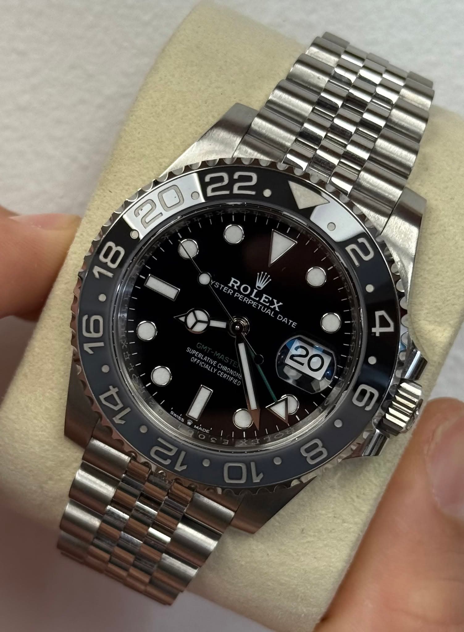 May be an image of wrist watch and text
