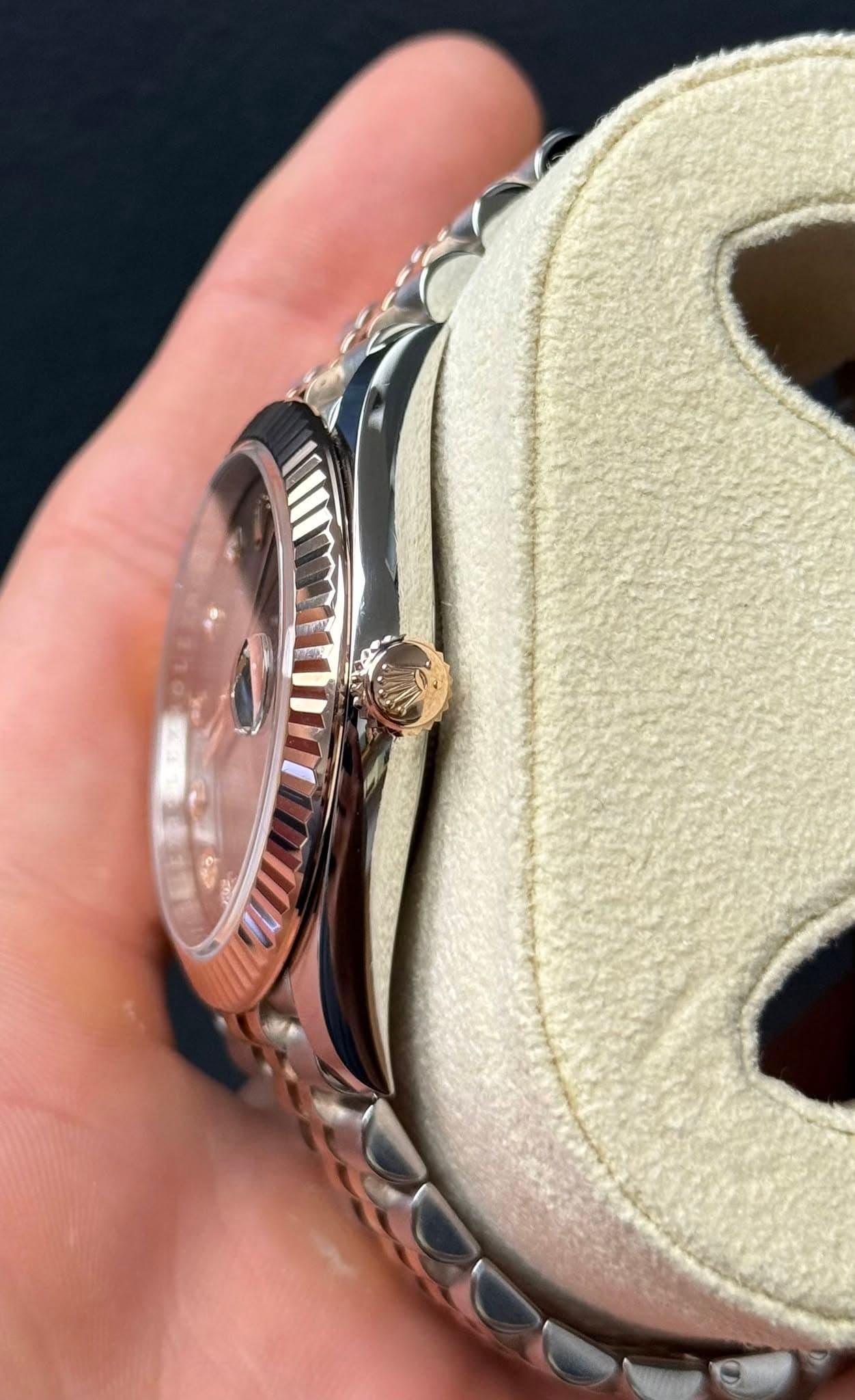 May be an image of wrist watch and text