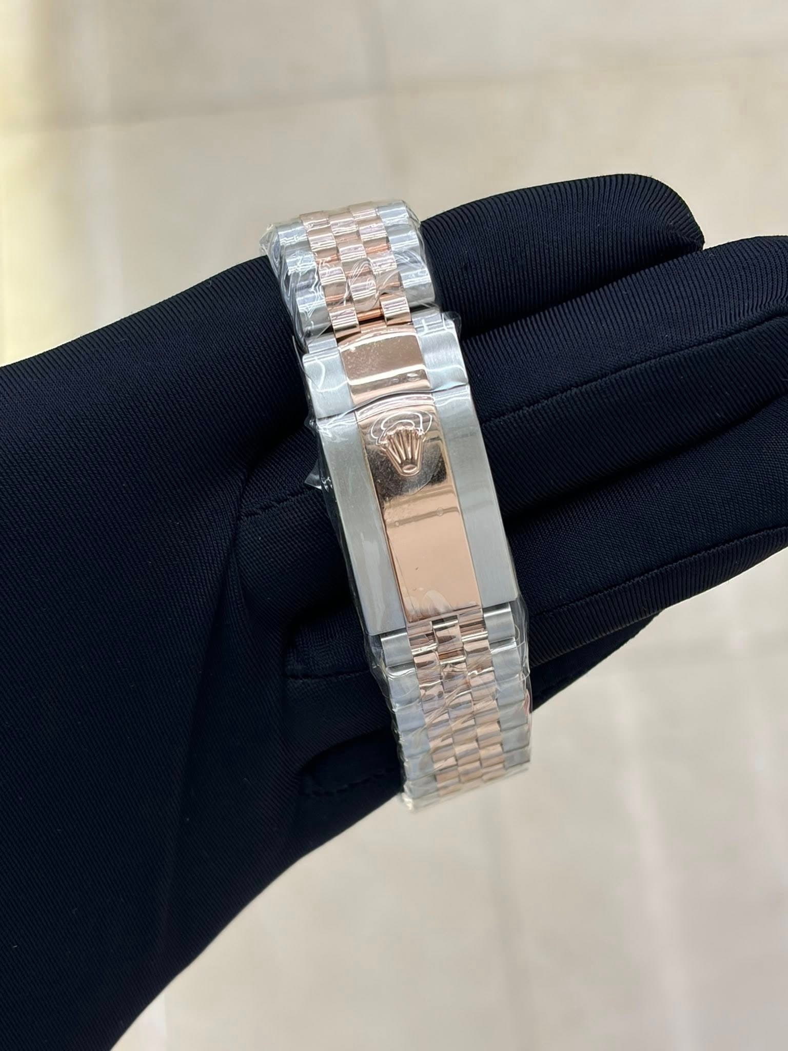 May be an image of jewelry and wrist watch