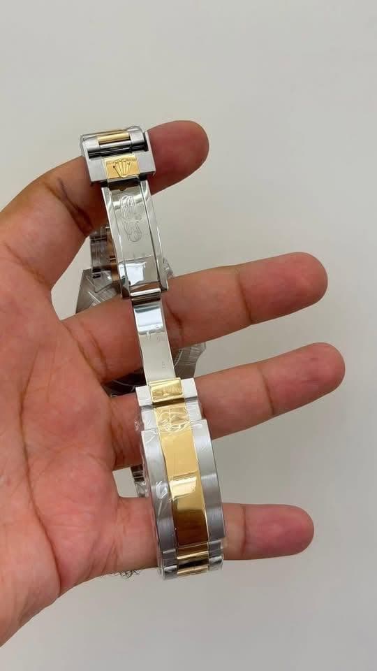 May be an image of jewelry and wrist watch