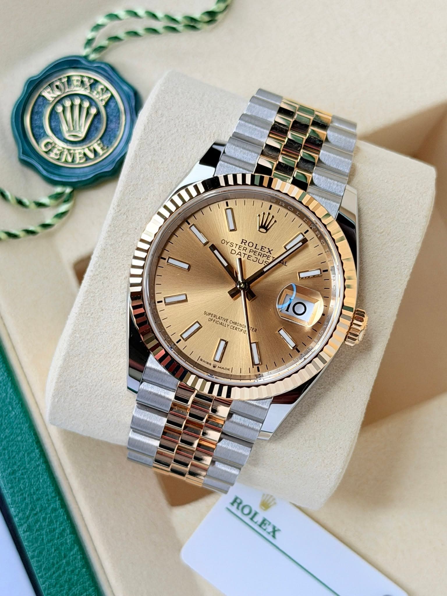 May be an image of wrist watch and text