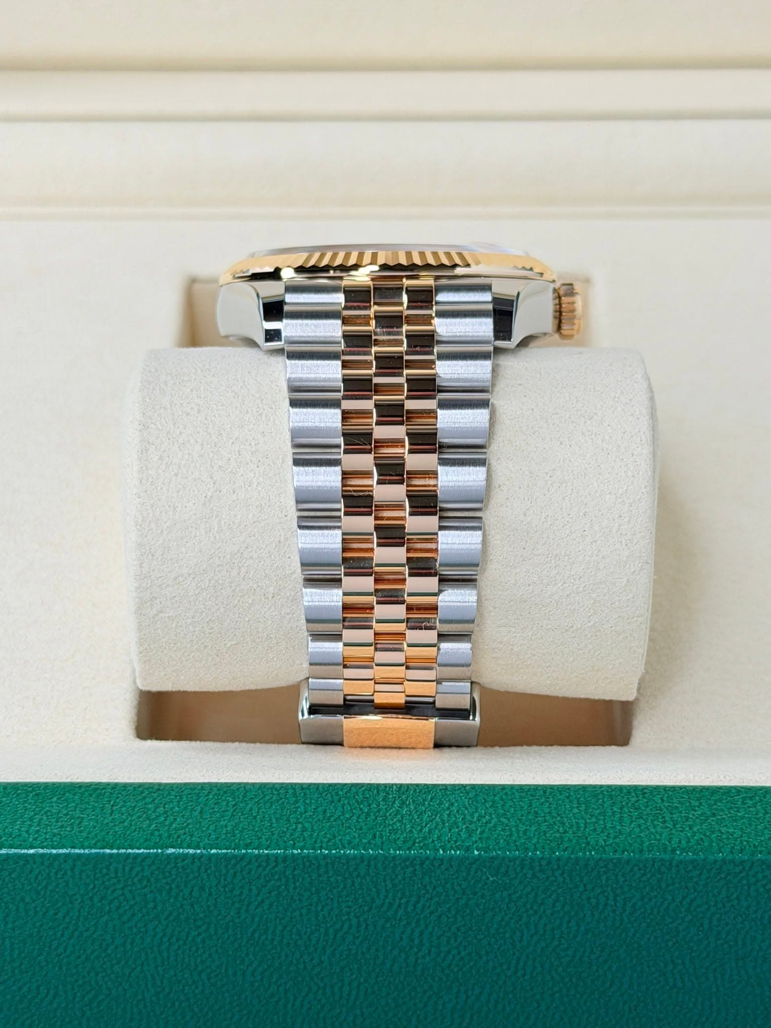 May be an image of wrist watch and text