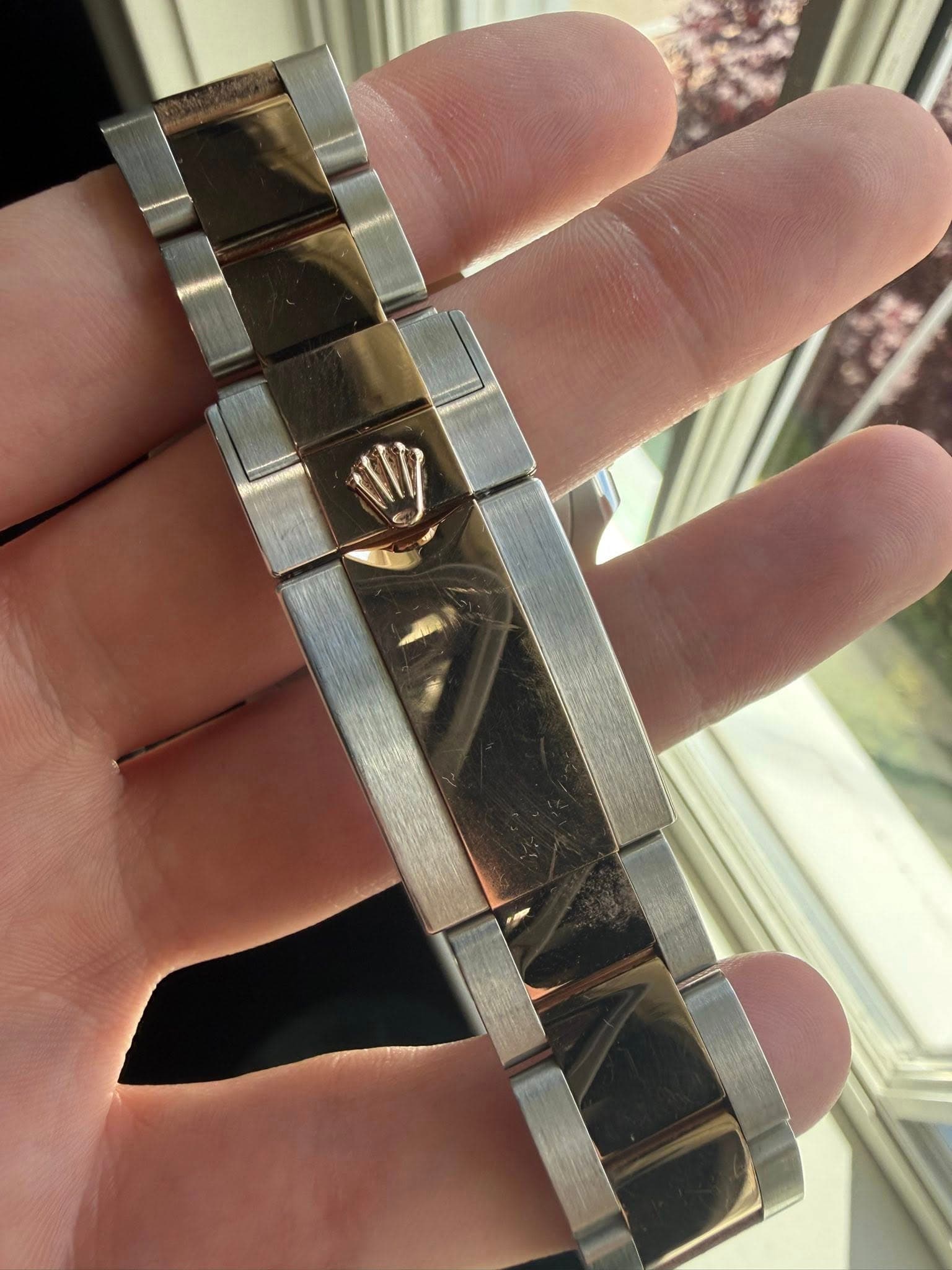 May be an image of wrist watch