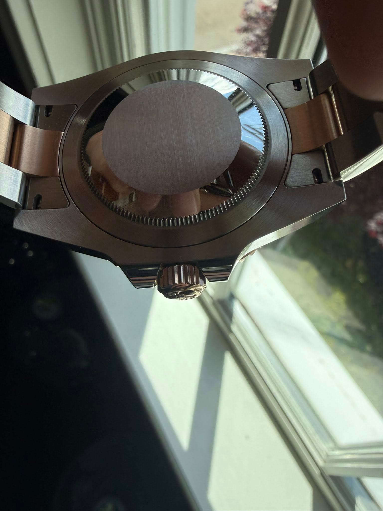 May be an image of wrist watch