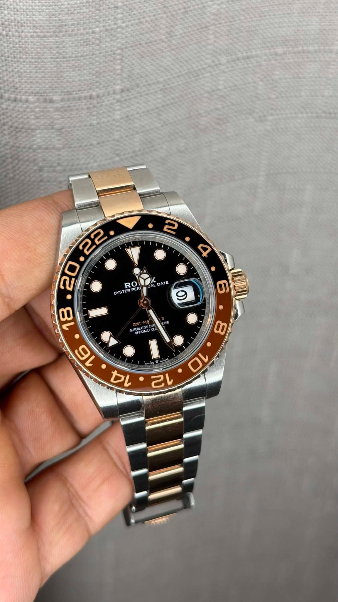 May be an image of wrist watch and text