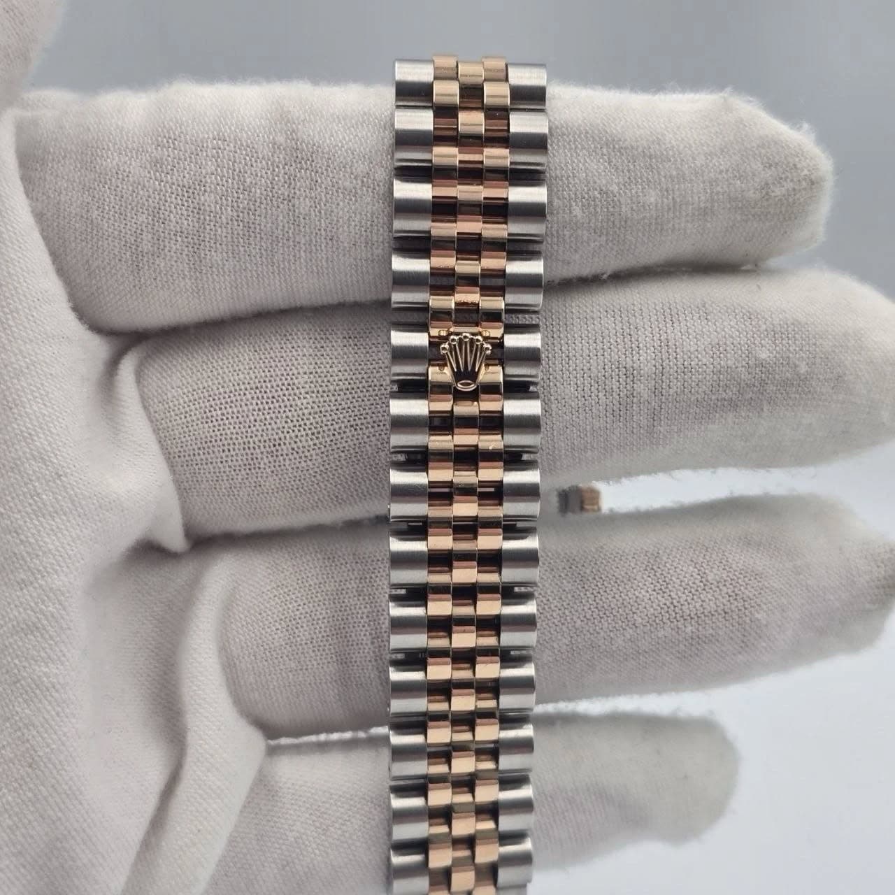 May be an image of wrist watch