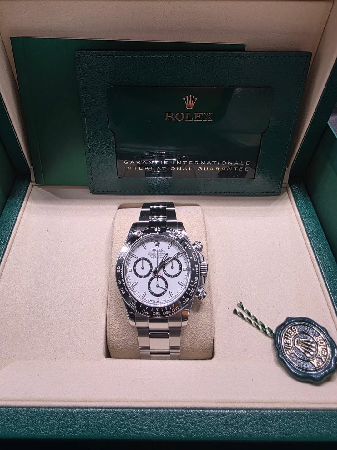 May be an image of wrist watch and text
