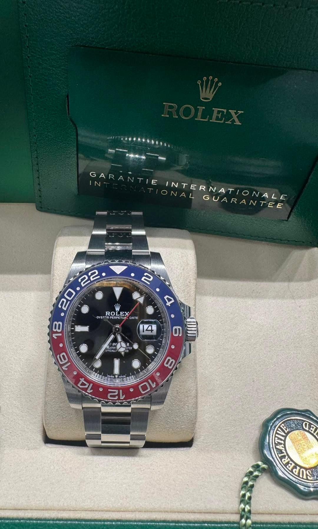 May be an image of wrist watch and text