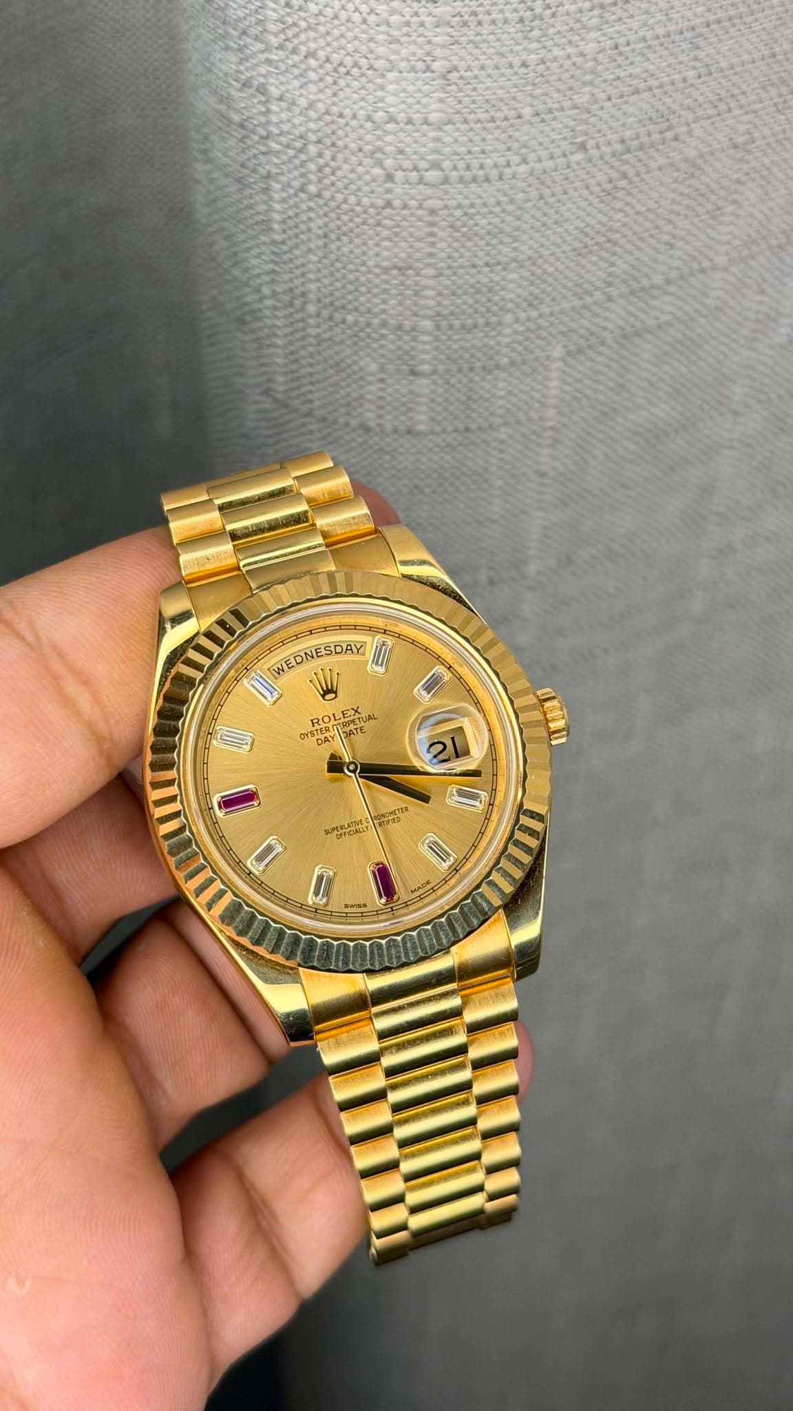 May be an image of wrist watch and text