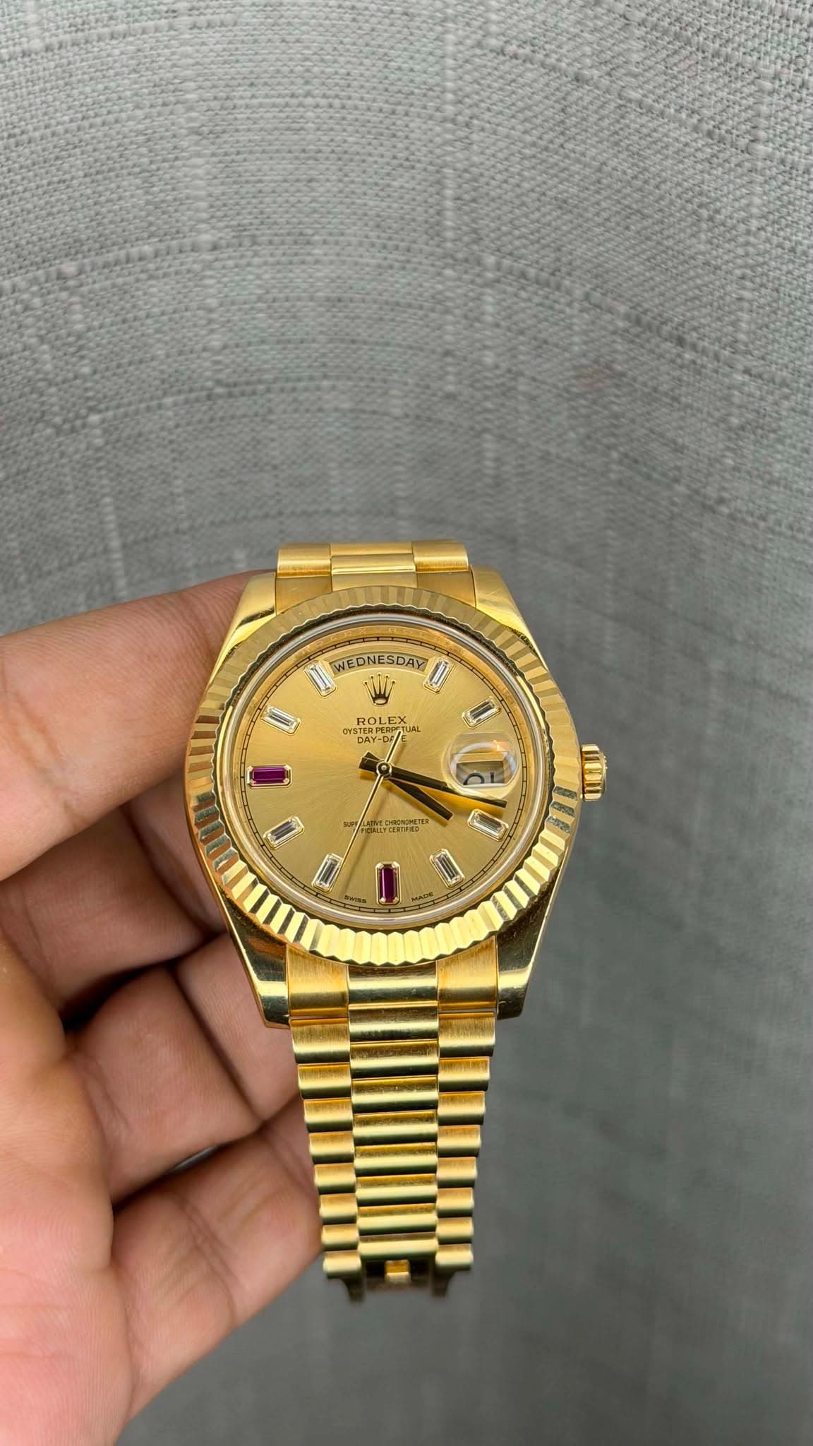 May be an image of wrist watch and text