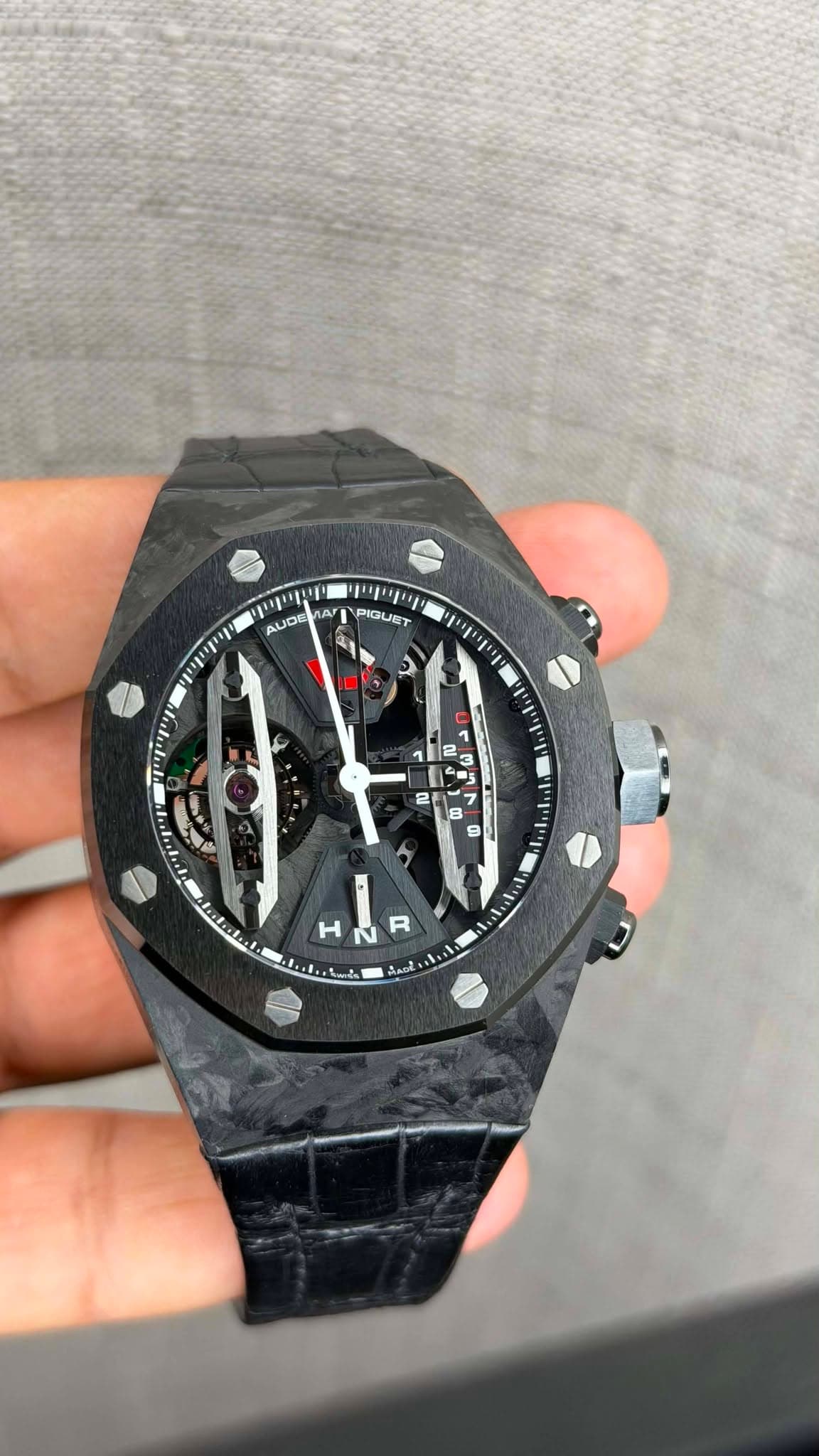 May be an image of wrist watch and text