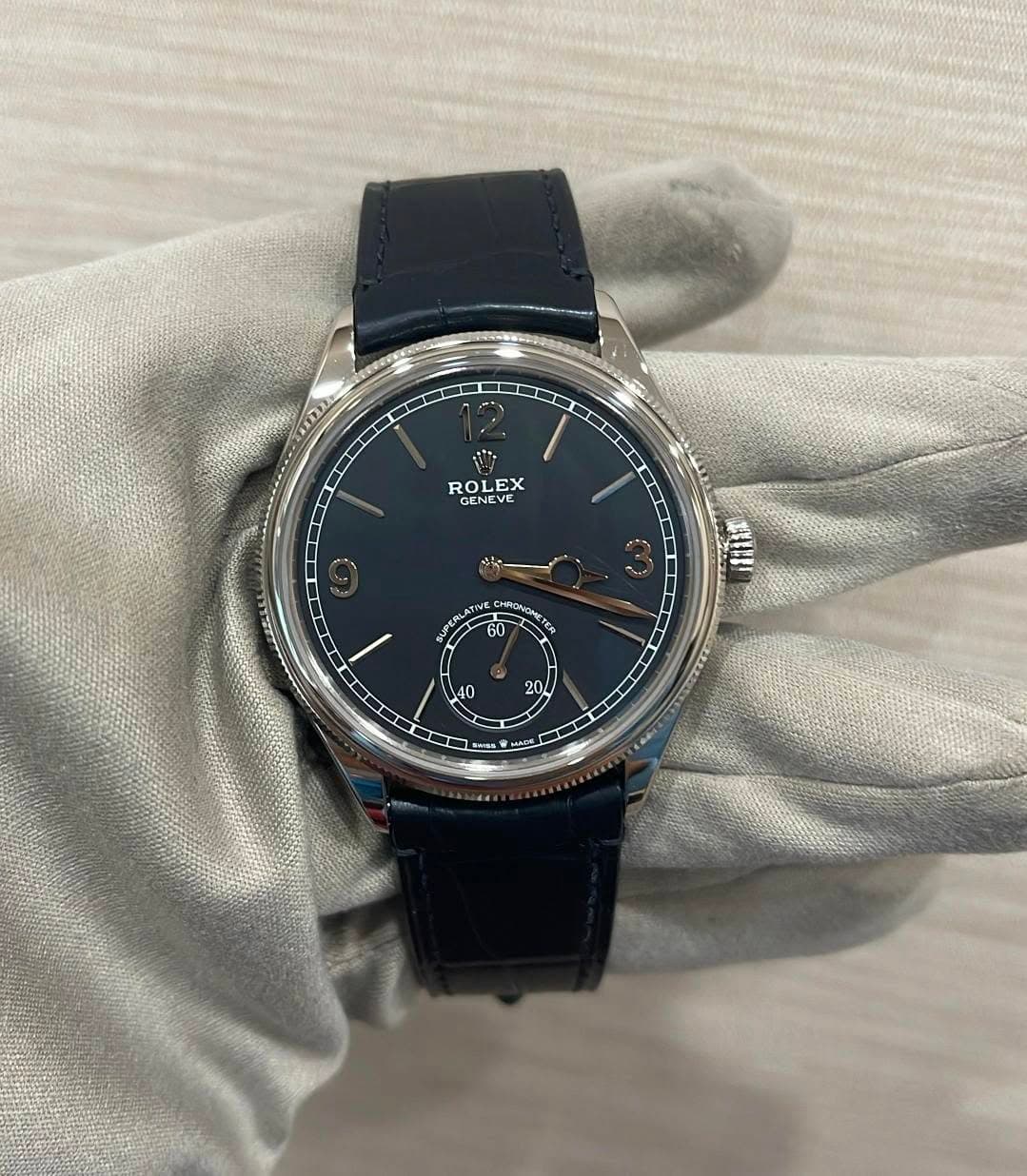 May be an image of wrist watch and text