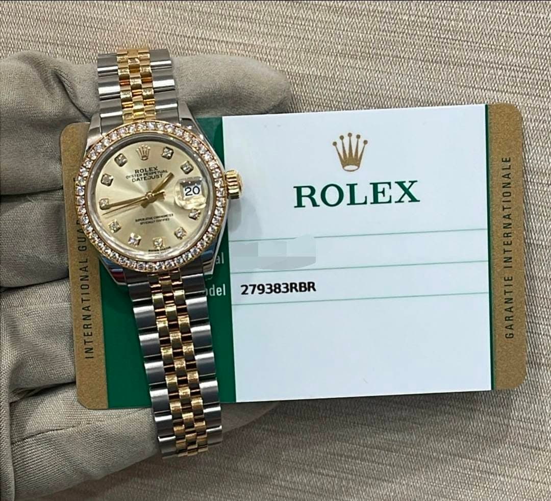 May be an image of wrist watch and text