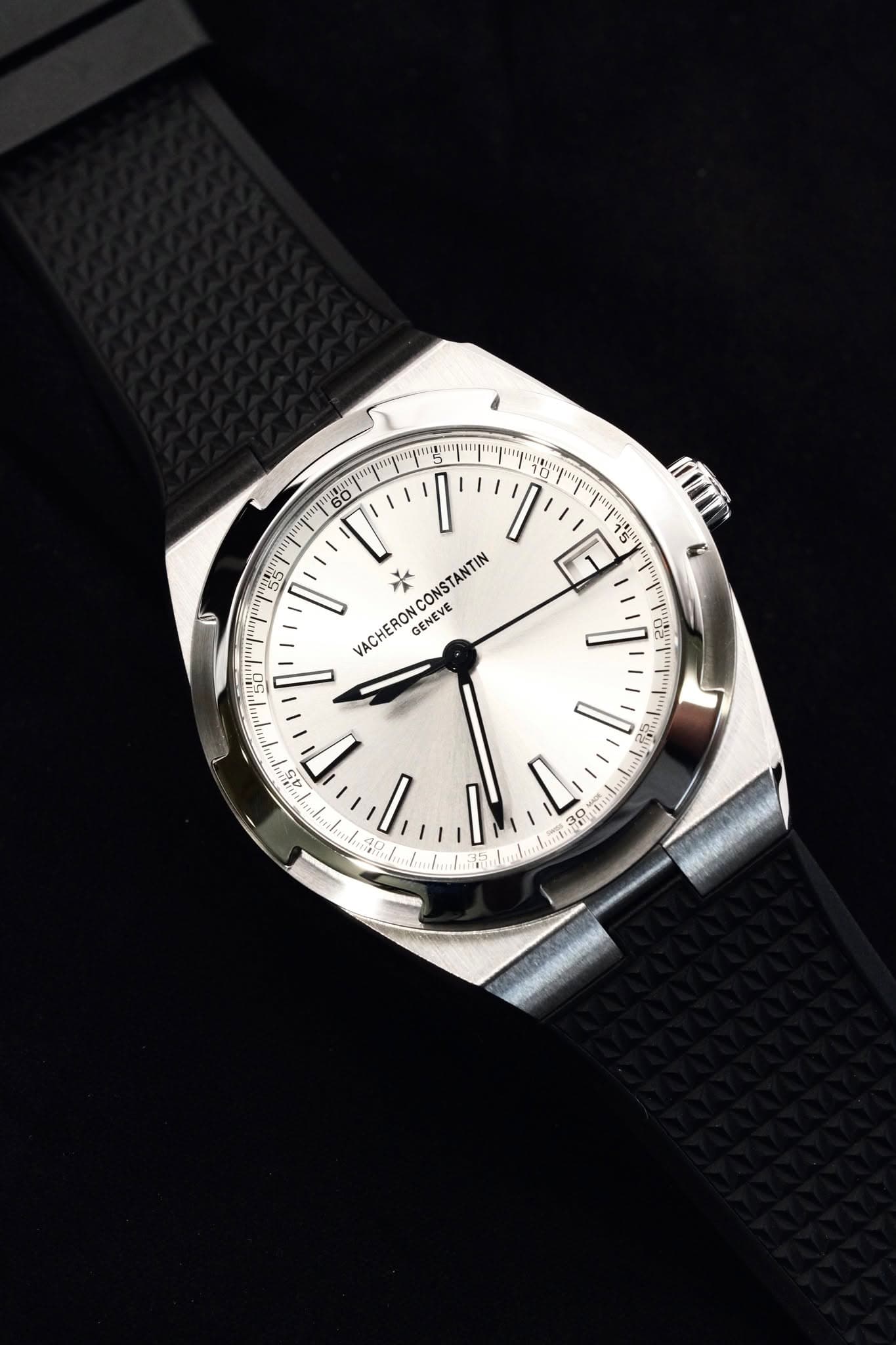 May be an image of wrist watch and text