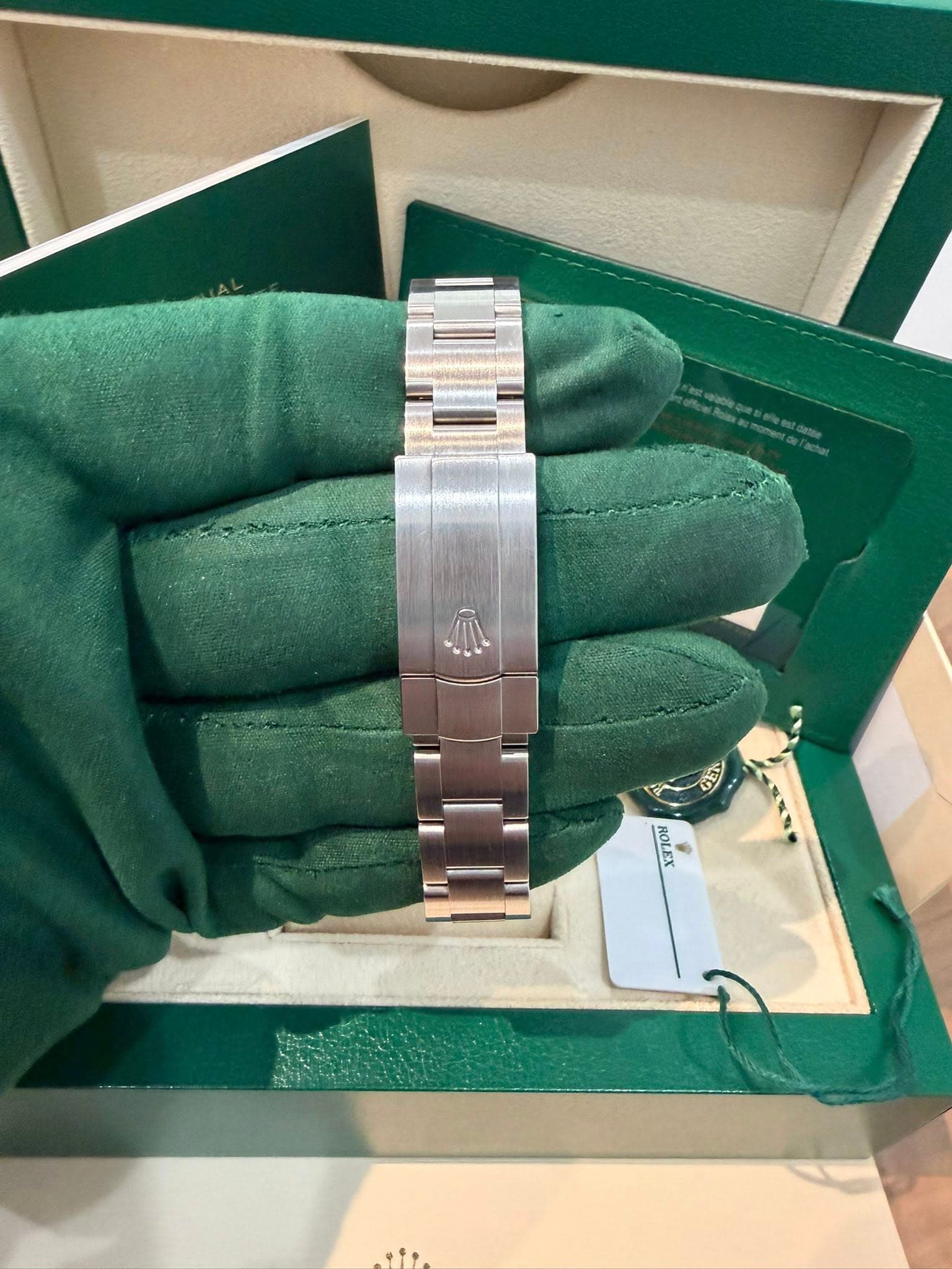 May be an image of wrist watch and text