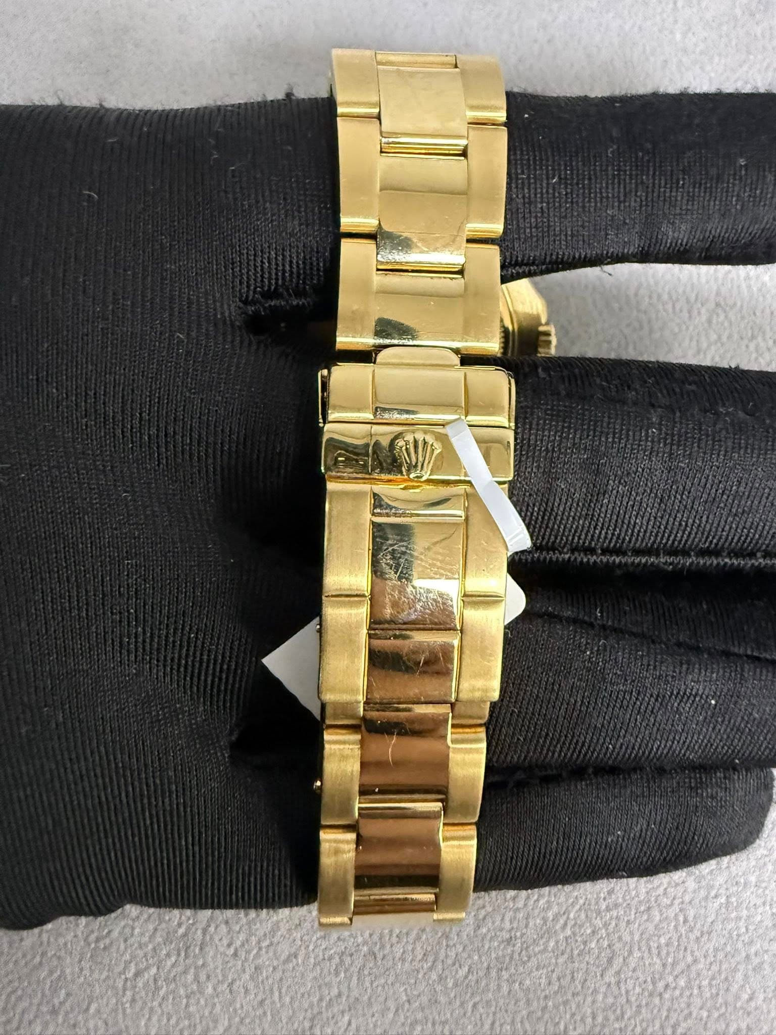 May be an image of wrist watch