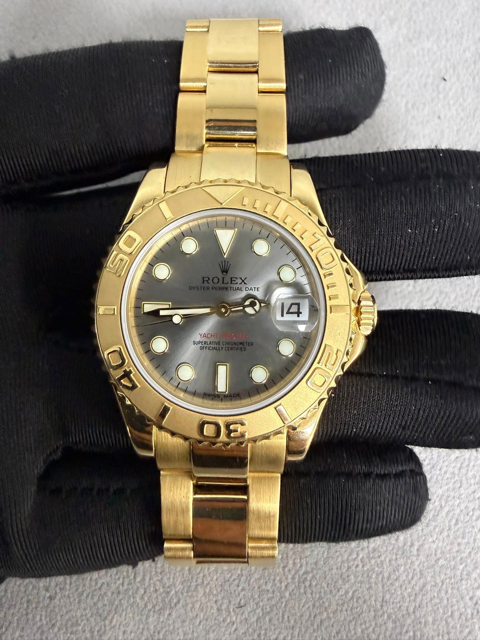 May be an image of wrist watch and text
