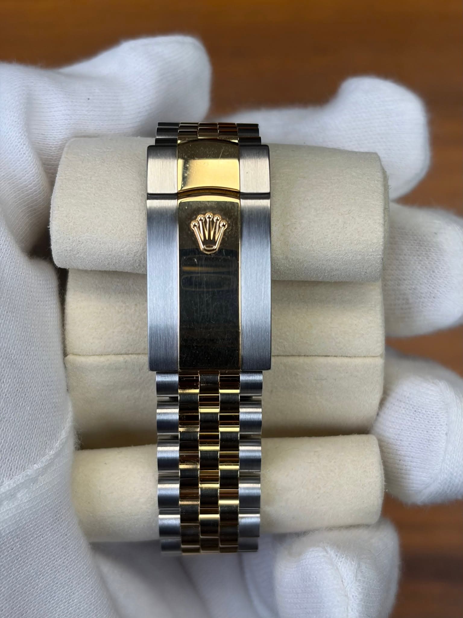 May be an image of wrist watch and text