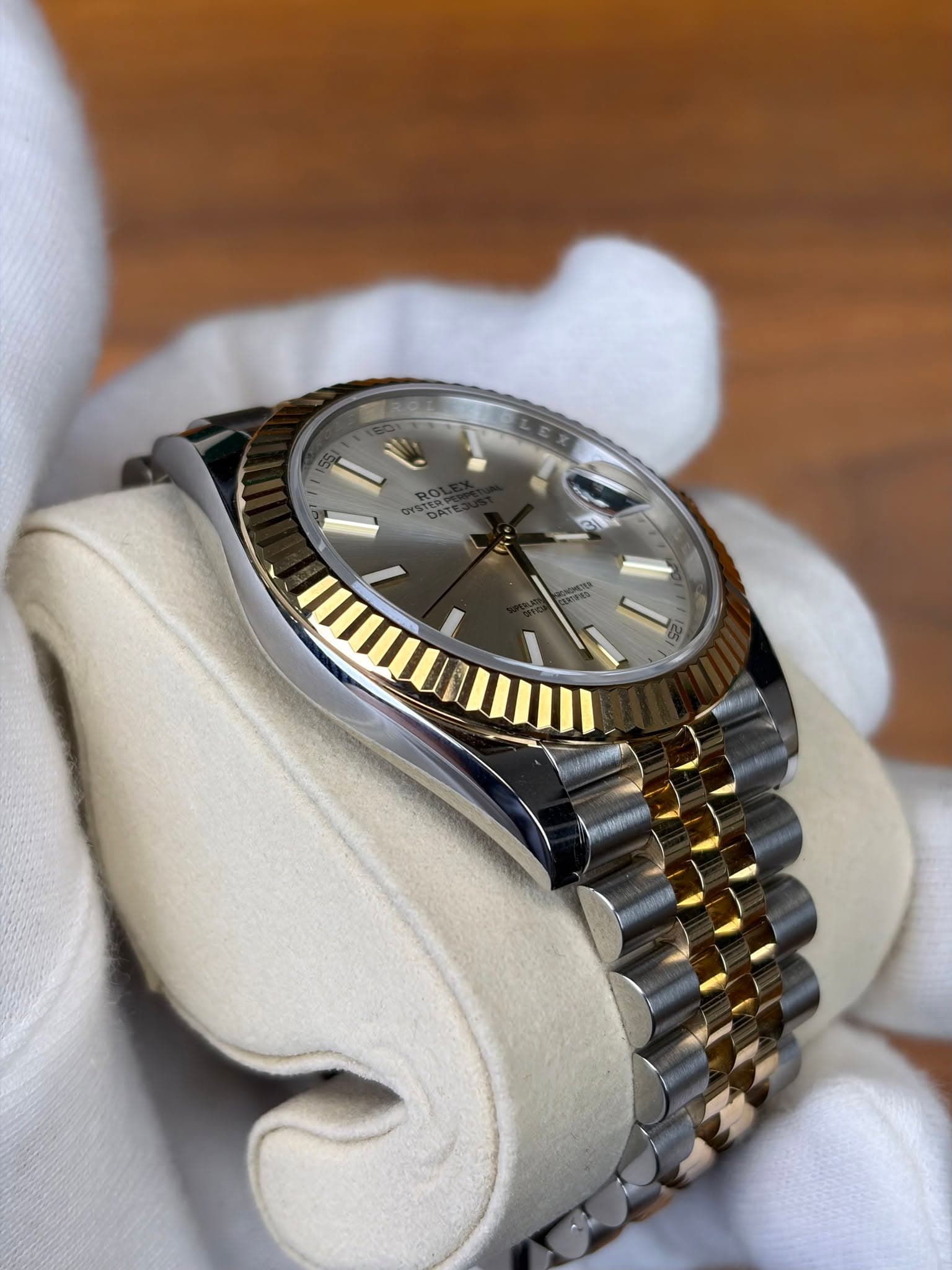 May be an image of wrist watch and text
