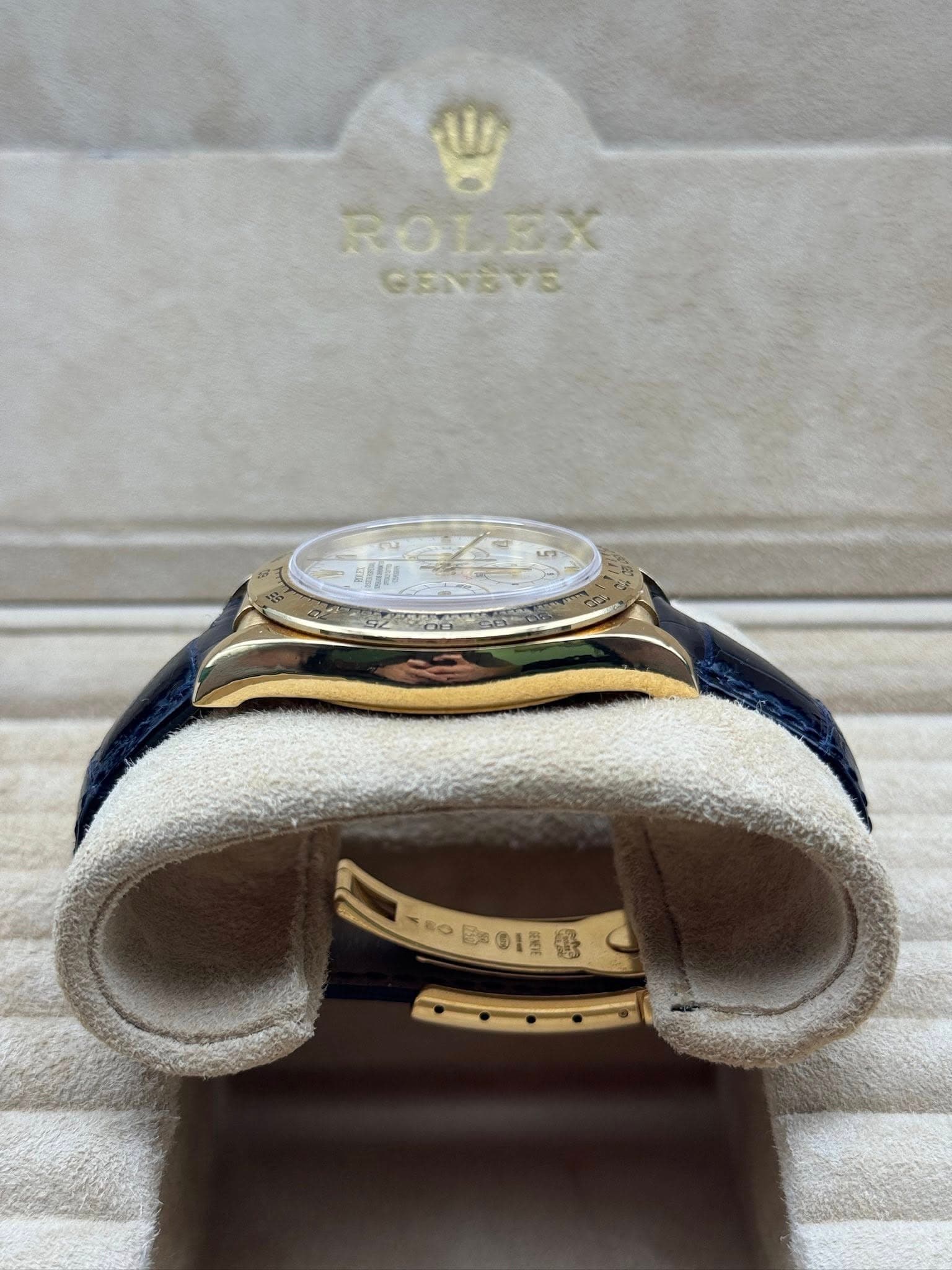 May be an image of wrist watch and text