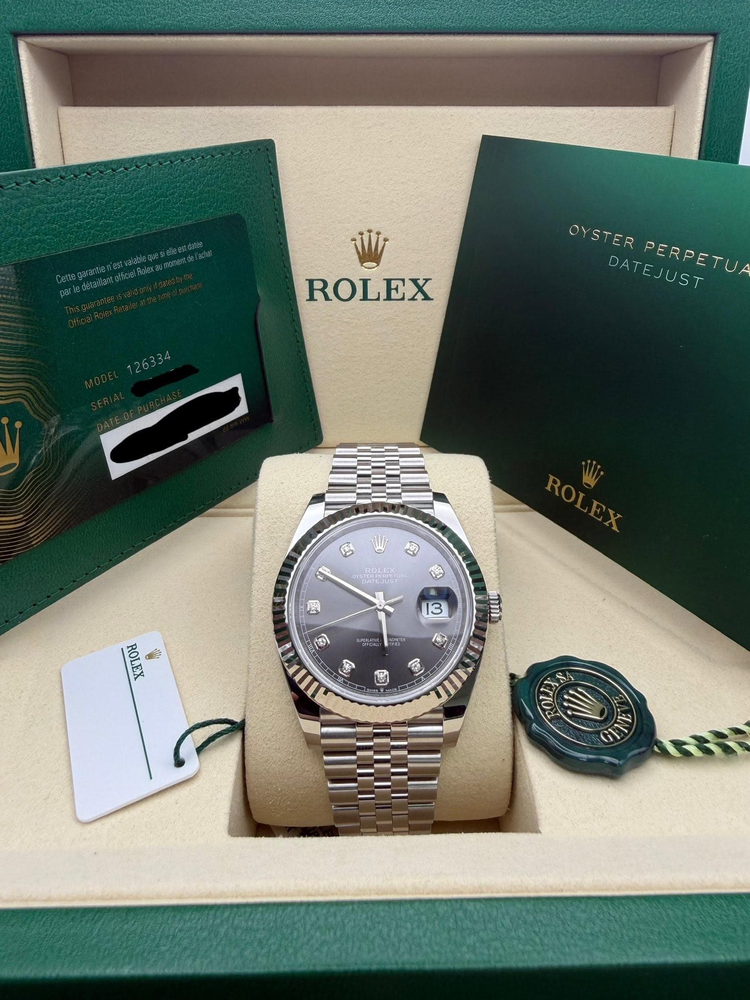 May be an image of wrist watch and text that says 'ROLEX OYSTER DATEJUST DATEJUST CNSTERPERRETU ERPERPETU PERPETUA B าล a 台 国 13 ه ROLEX ROLEX 會 aCa mm S /2 4 色 9 ROLJ'