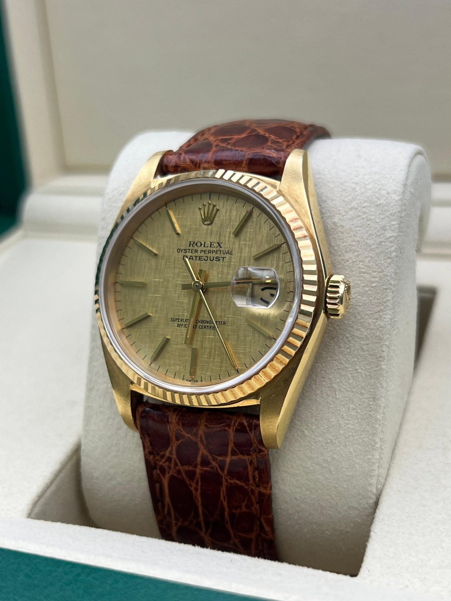 May be an image of wrist watch and text