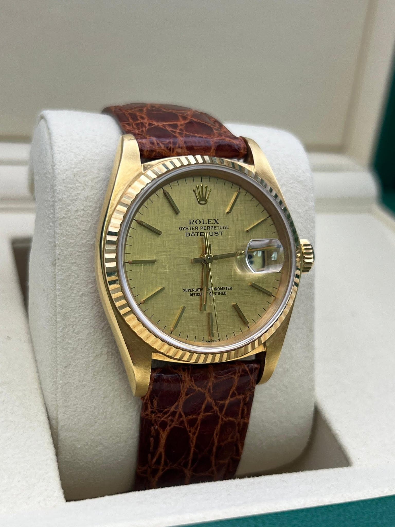 May be an image of wrist watch and text