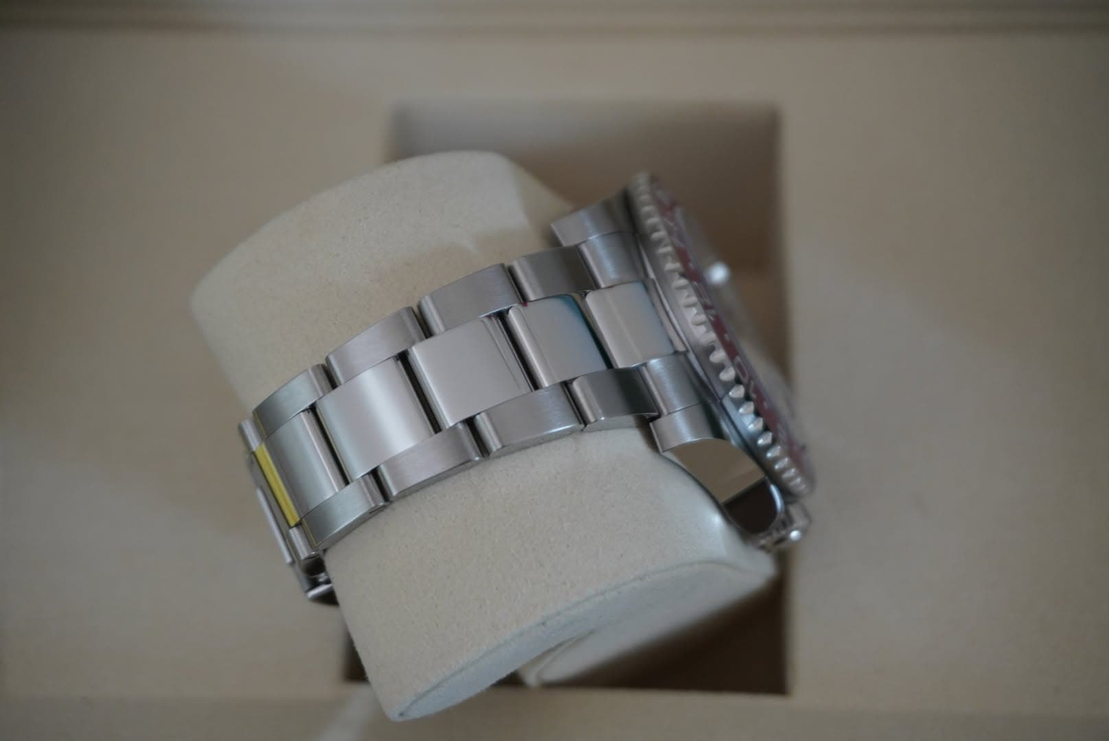 May be an image of wrist watch and text