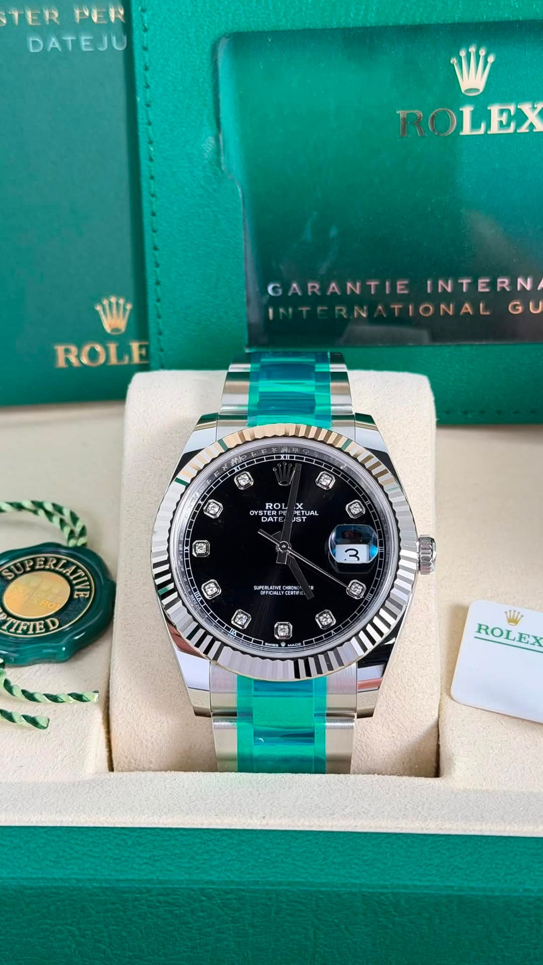 May be an image of wrist watch and text