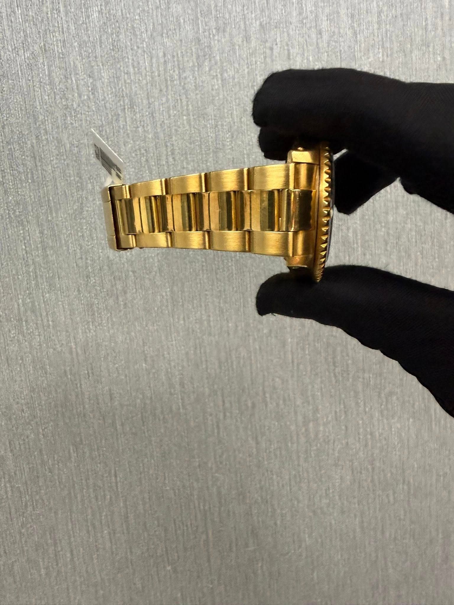 May be an image of wrist watch