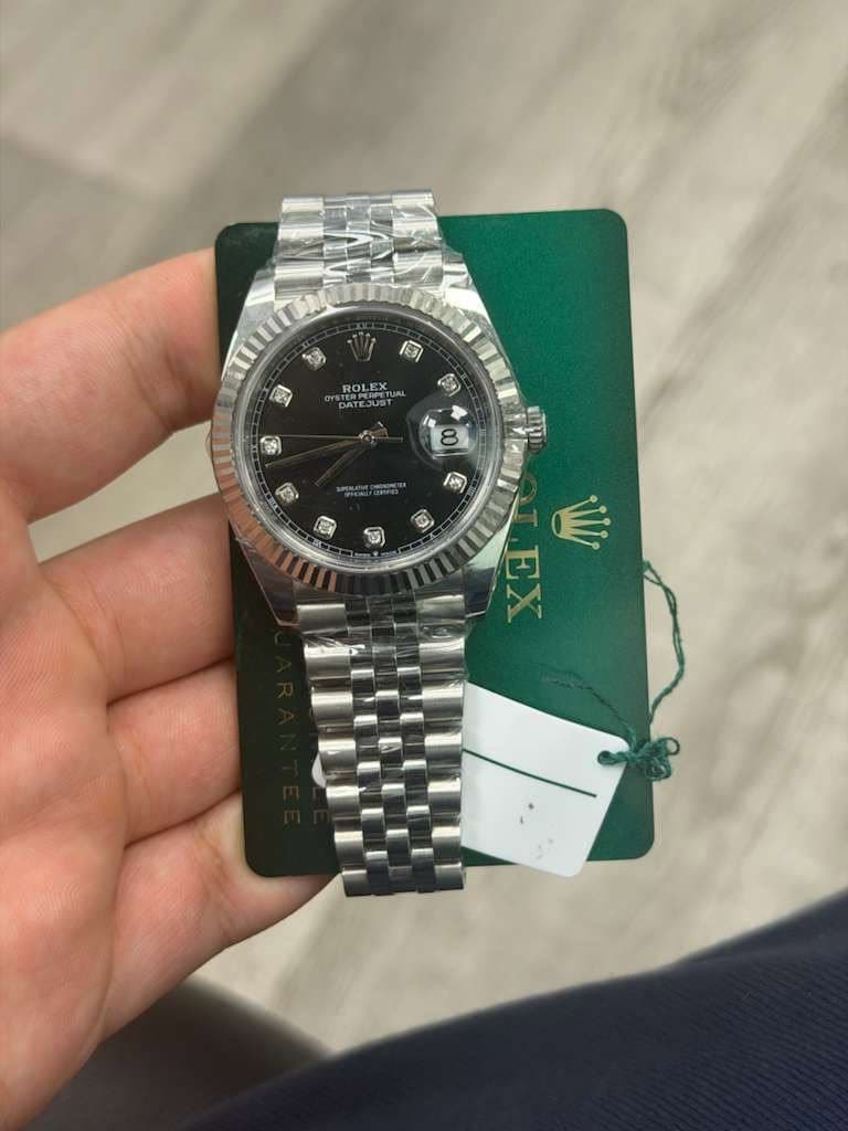 May be an image of wrist watch and text that says 'বল 國 6 ROLEX DATEDUST In ه 8 F LU 9, 零 မ S 山 EX'