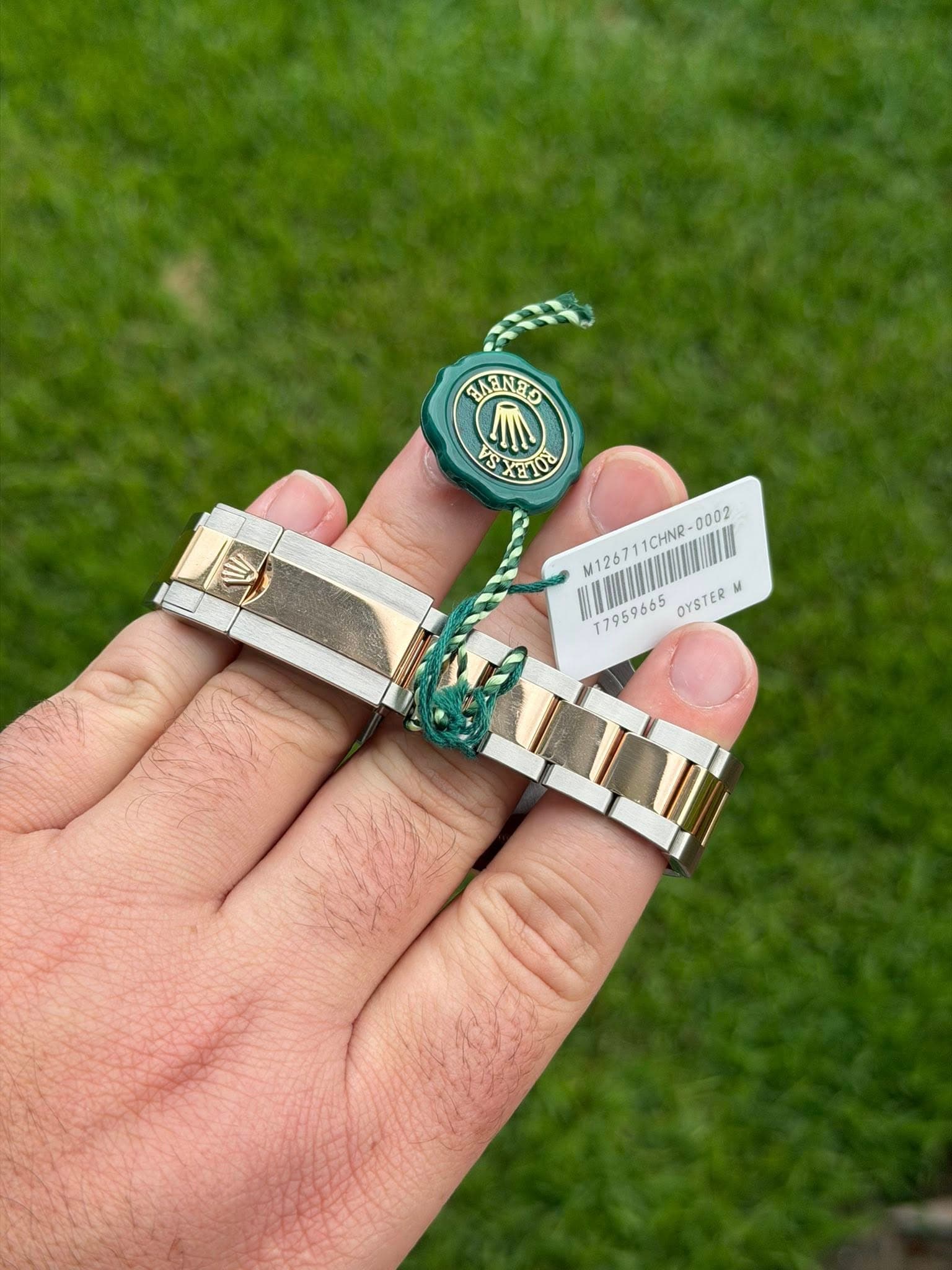 May be an image of wrist watch and text