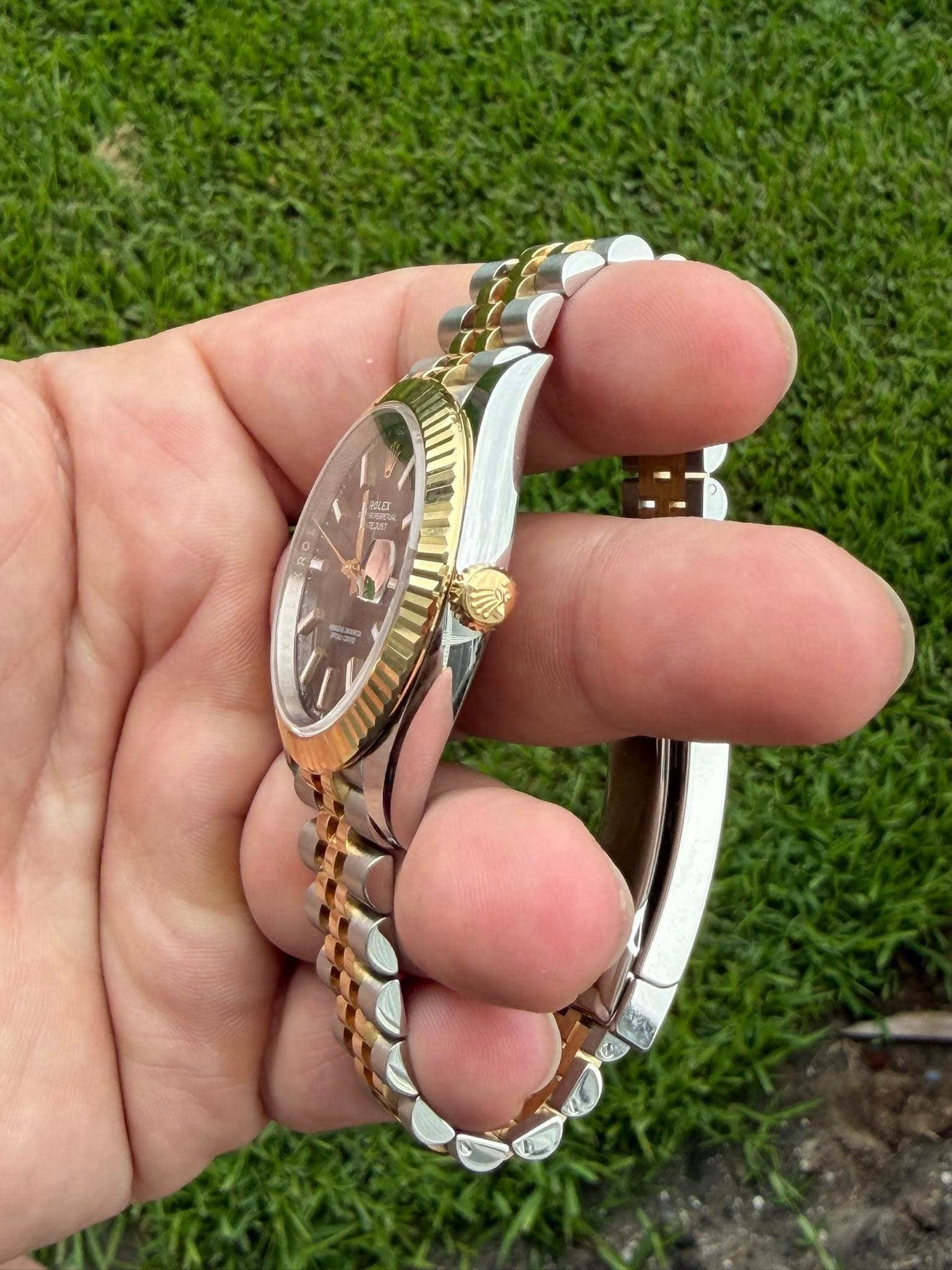 May be an image of wrist watch