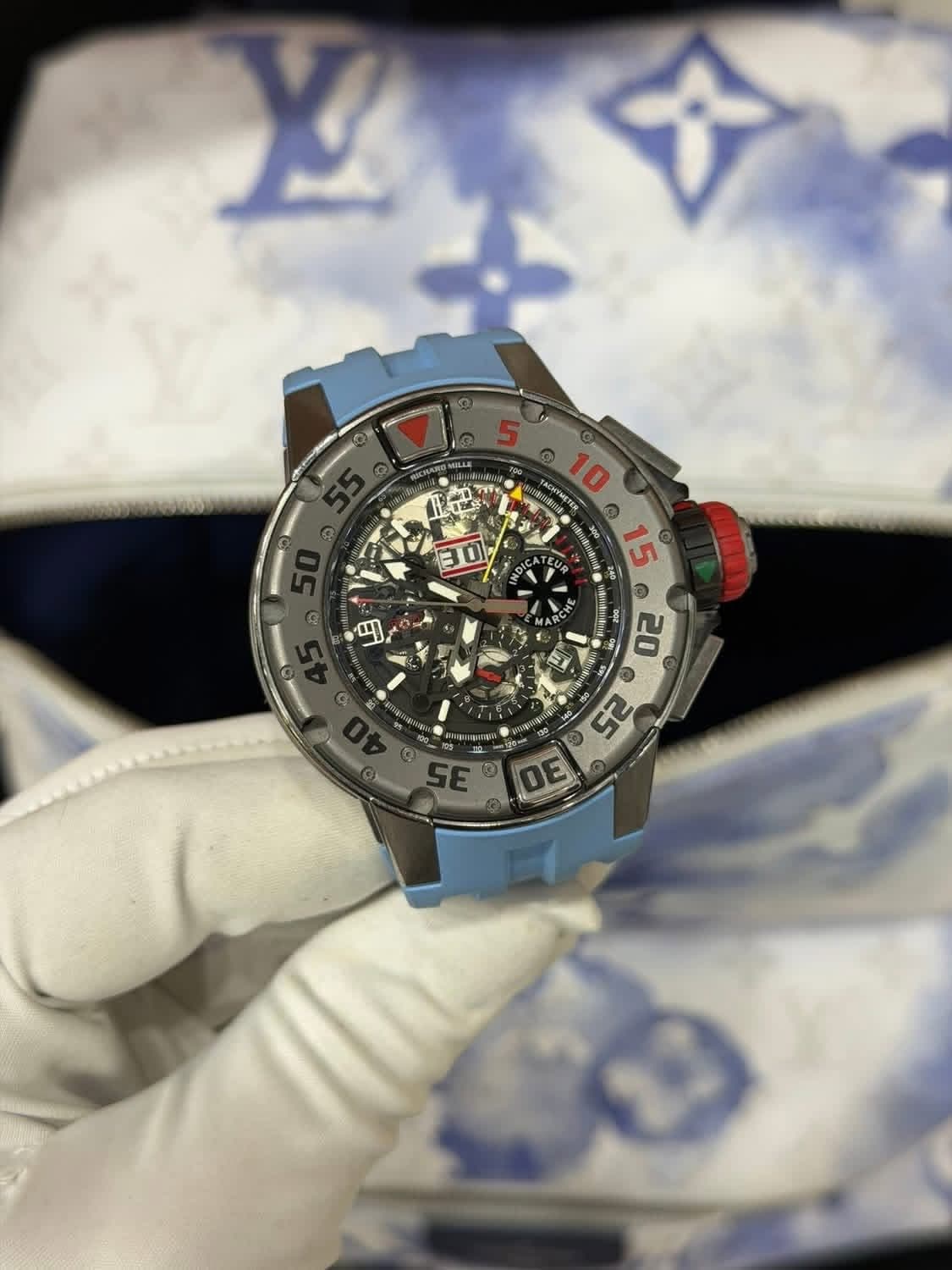 May be an image of wrist watch and text