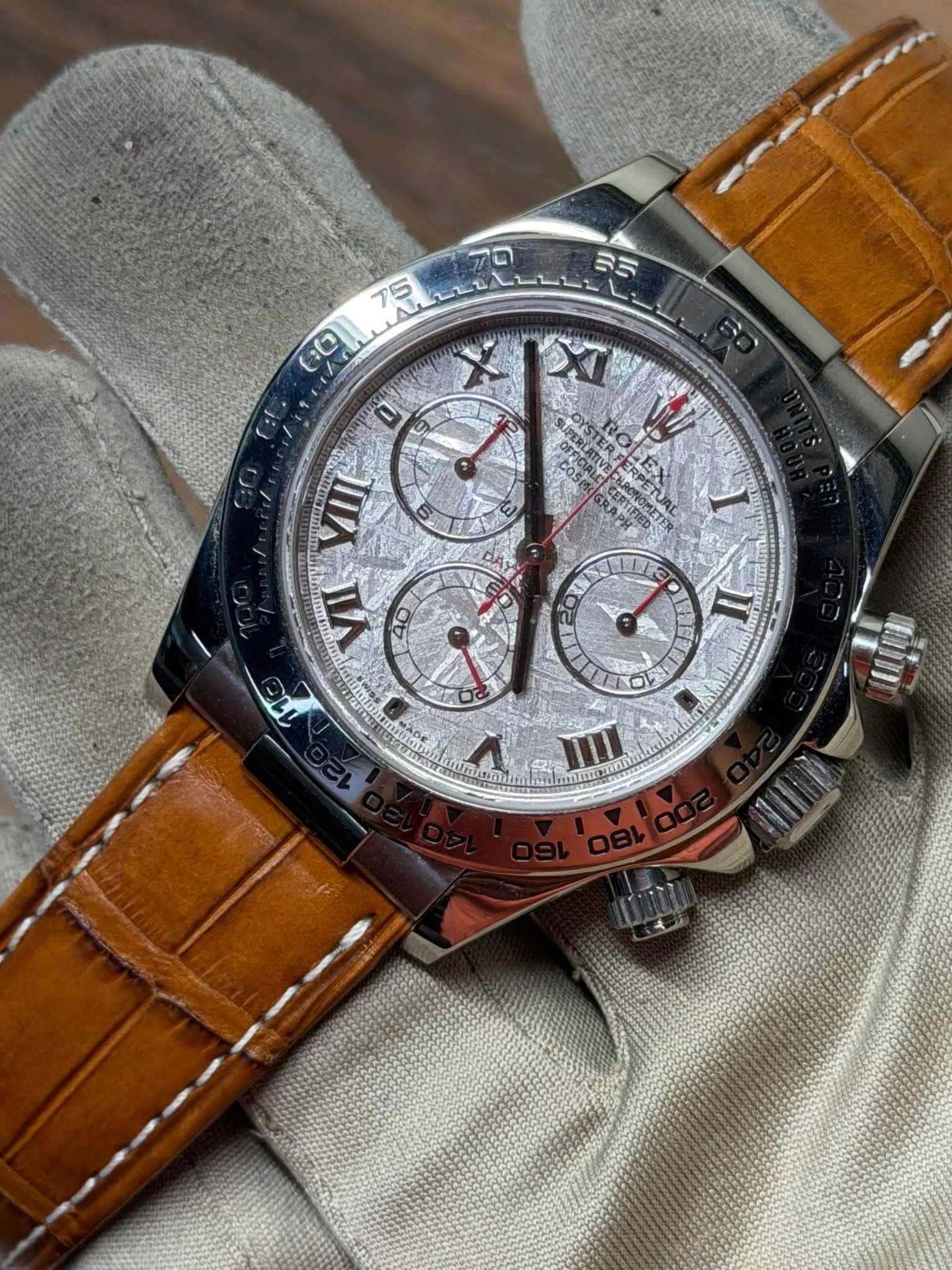 May be an image of wrist watch and text