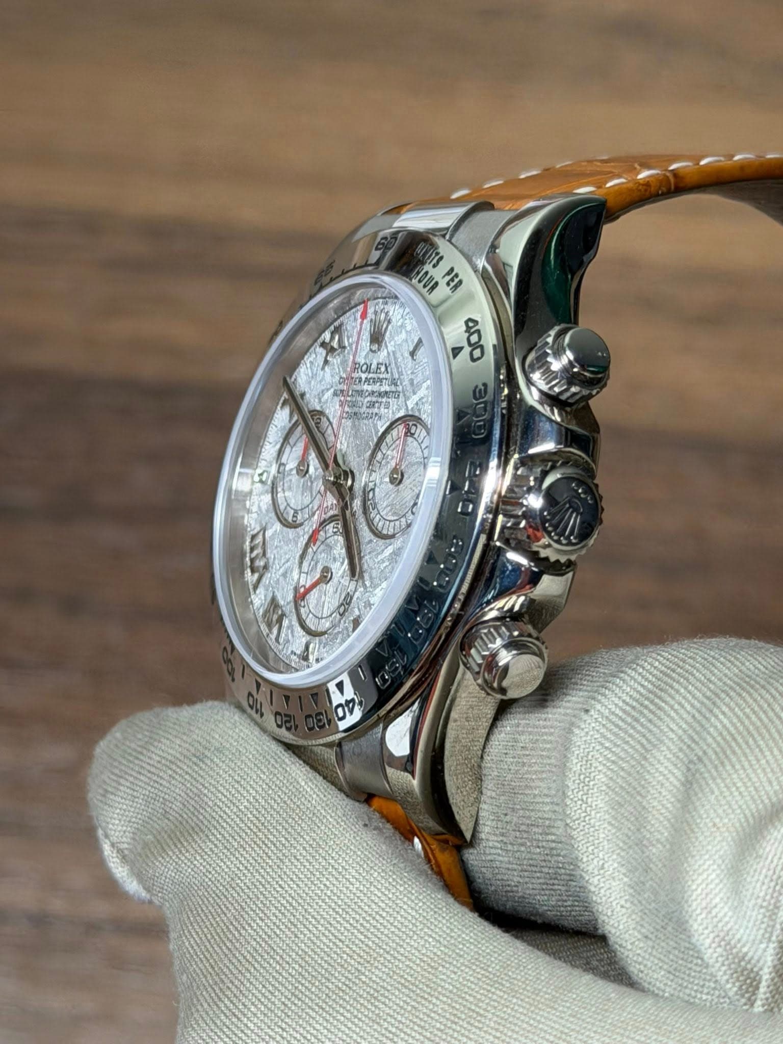 May be an image of wrist watch and text