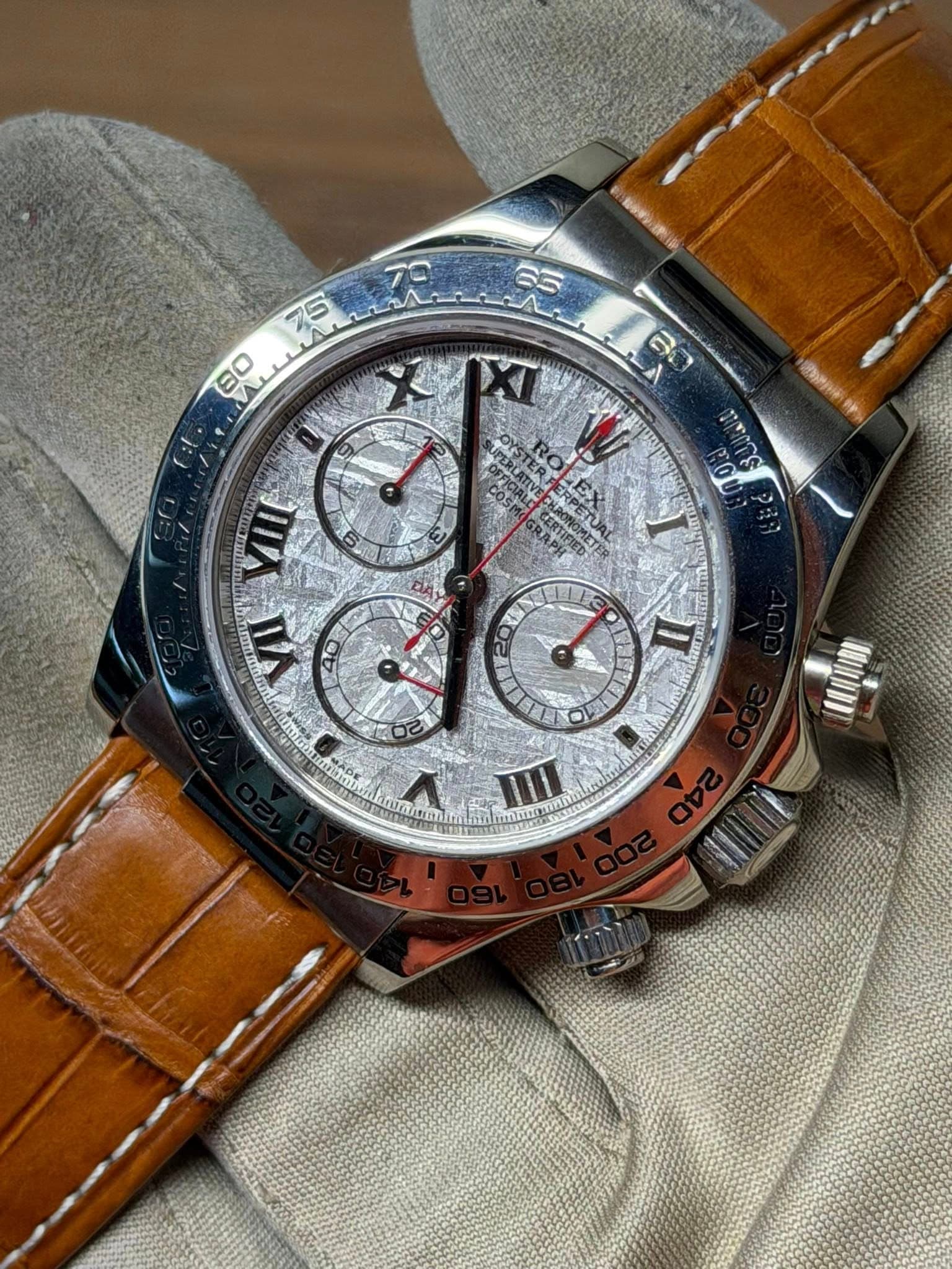 May be an image of wrist watch and text