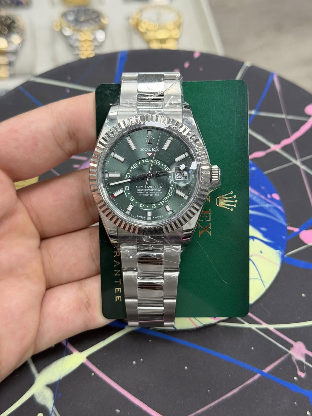 May be an image of wrist watch and text