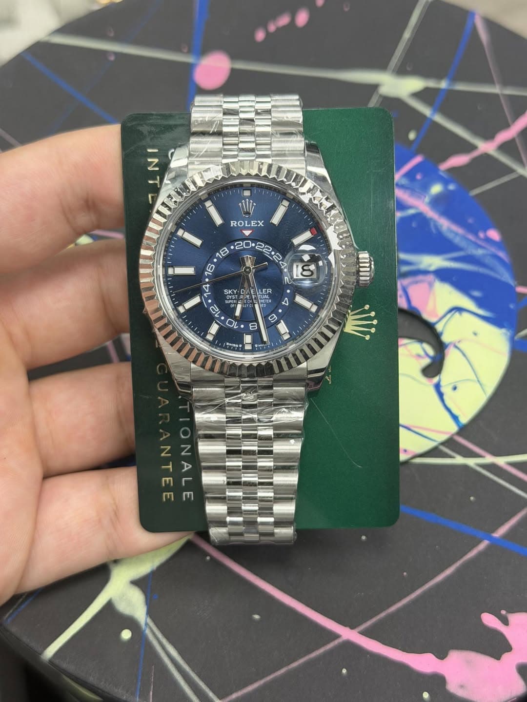 May be an image of wrist watch and text that says 'NI - ROL ROLEX EX °C 22.2 ه 16 4 E tO 4 o 12 M 00 mIm א D O 8 ትምናዊ NTEE E ONALE'
