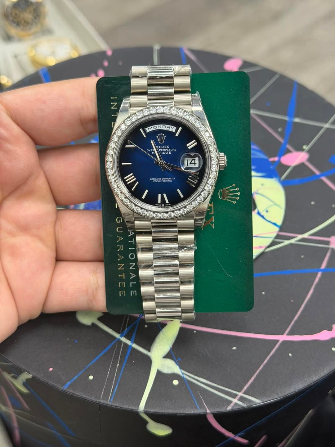 May be an image of wrist watch and text