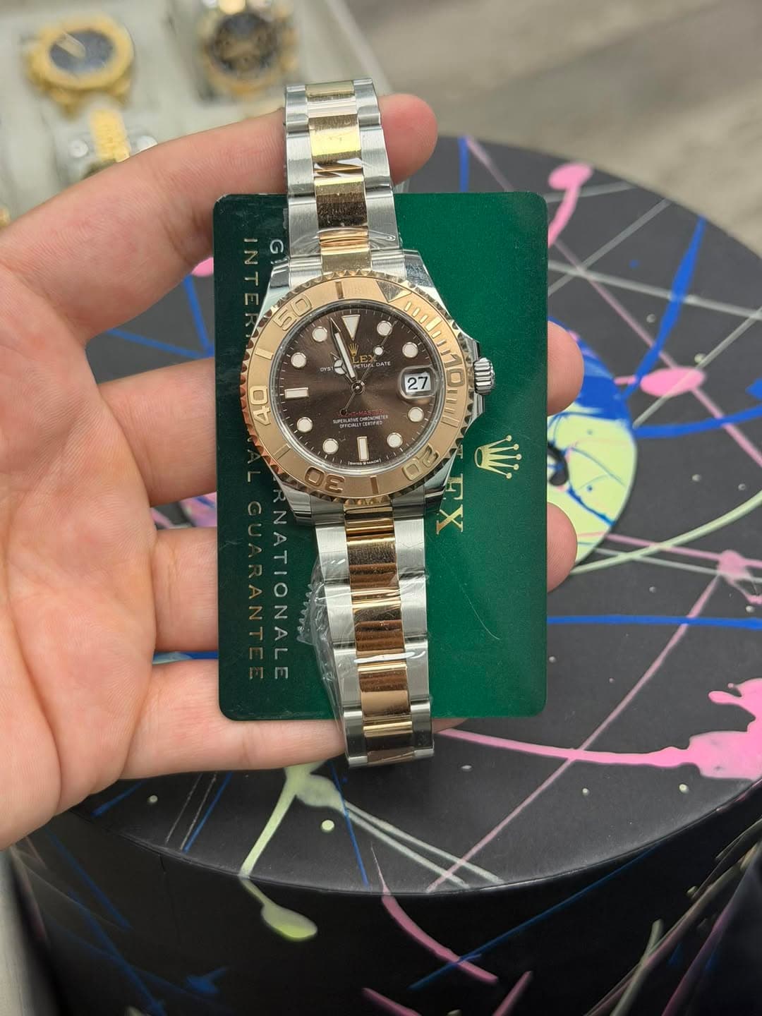 May be an image of wrist watch and text