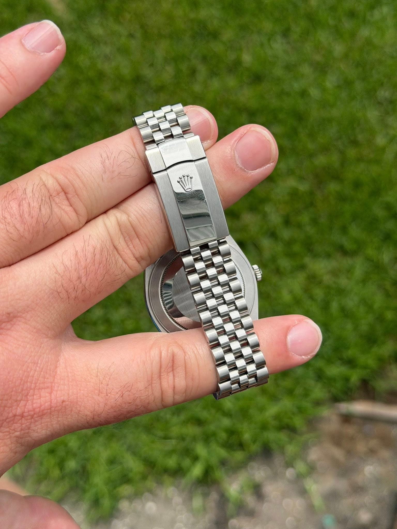 May be an image of wrist watch
