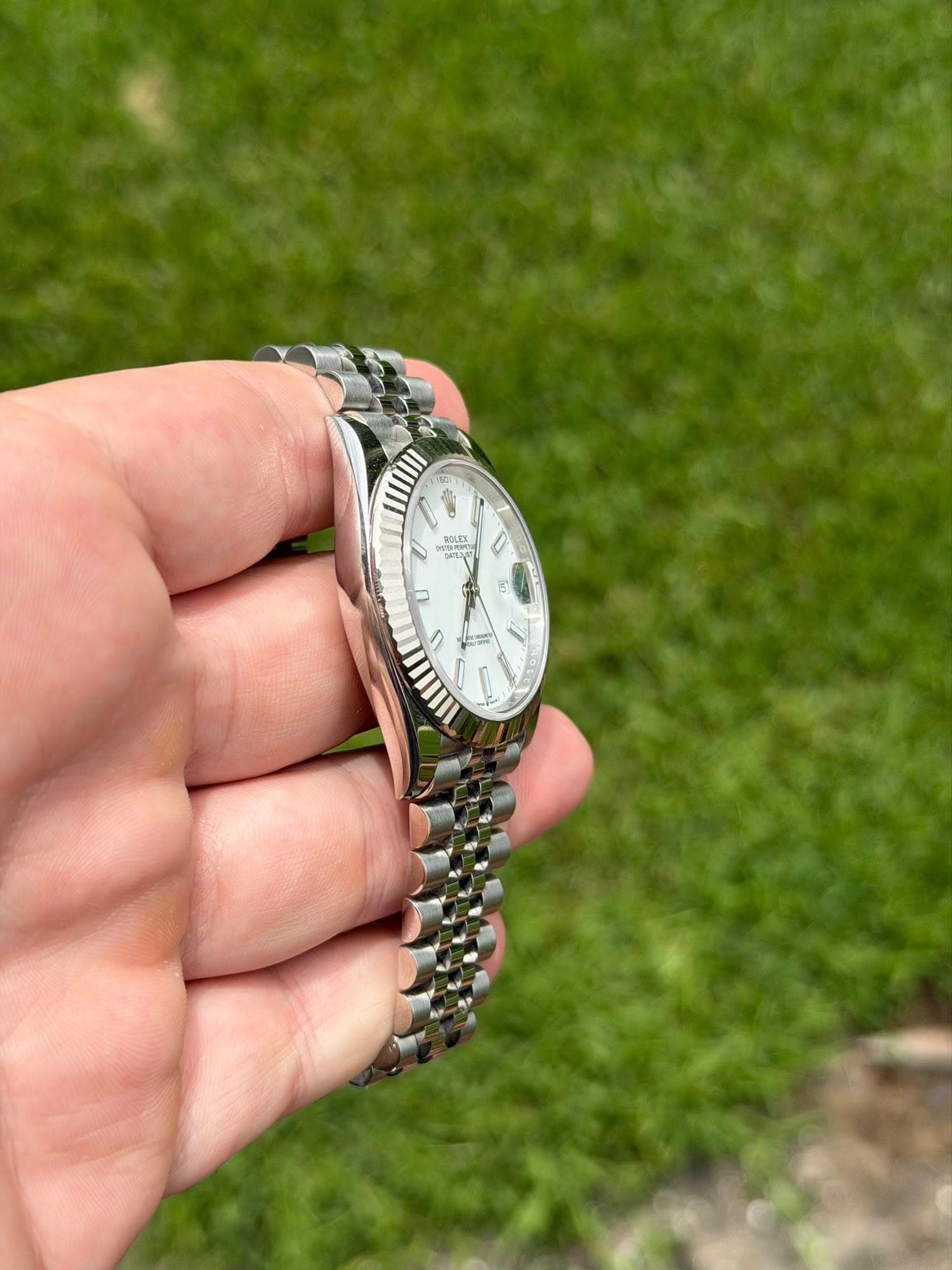 May be an image of wrist watch