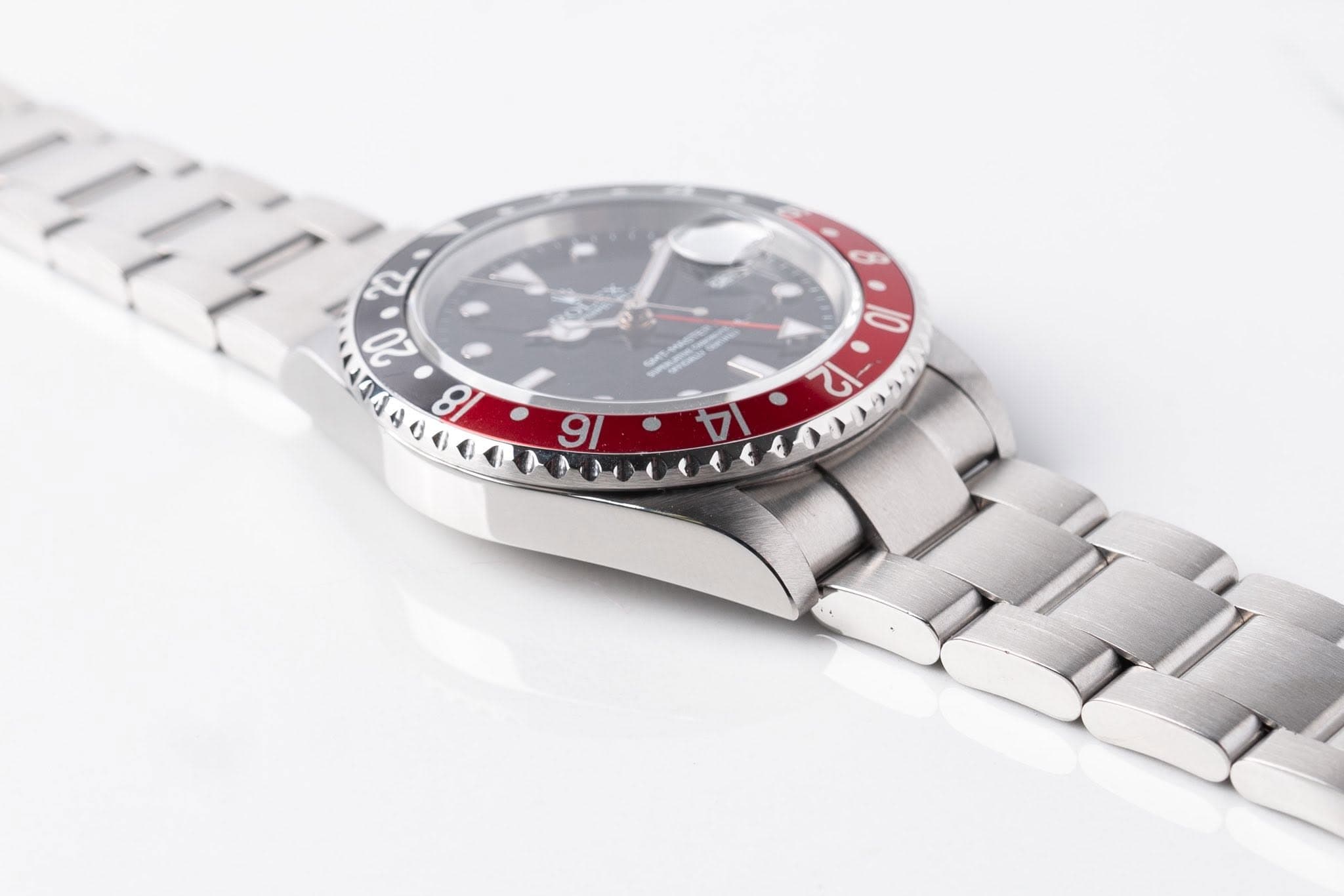 May be an image of wrist watch and text