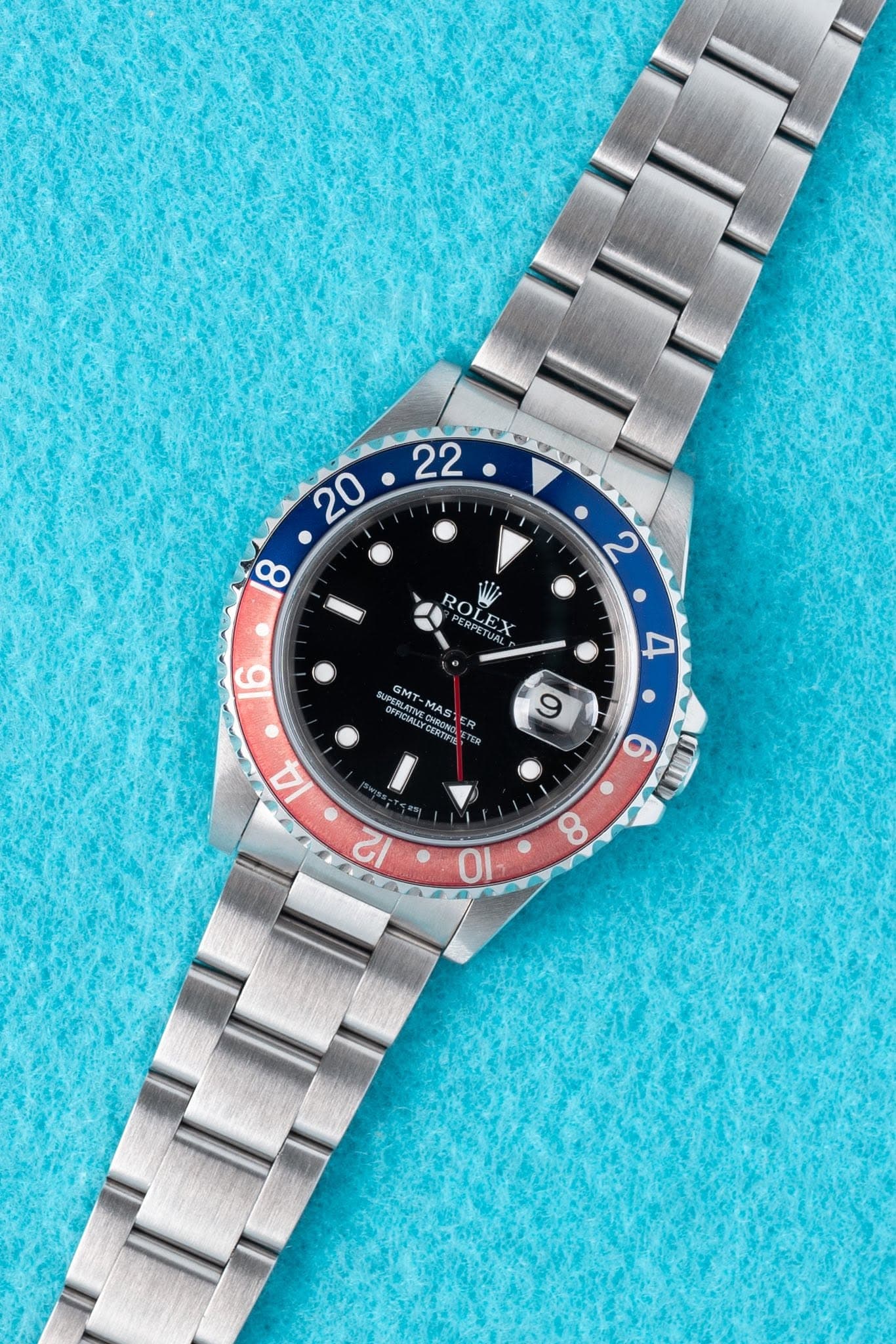 May be an image of wrist watch and text that says ' న ROLEX ROI 16 4 OFFICINT PERLATIV GMT MAS AS CHRONG CEST ERTIFIE CR 9 4 6 ULII 12 8 10'