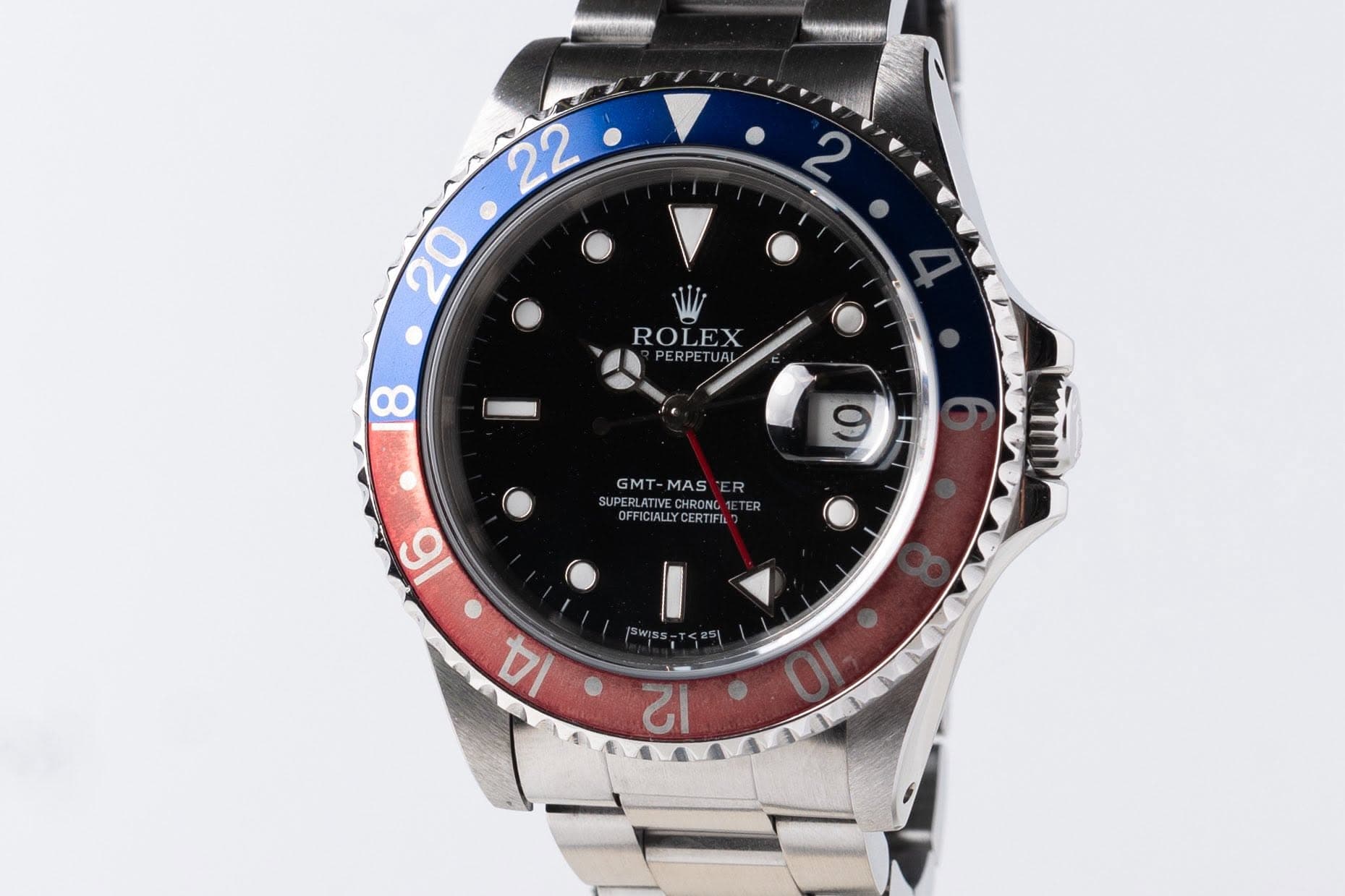 May be an image of wrist watch and text that says '2 22 20 ROLEX ERPETUR TU 8 9 GMT GMT-MASER SUPERER MAS MAS SUPERLATIVE CHRONC1E ALLY ERTIFI خن 16 14 12'