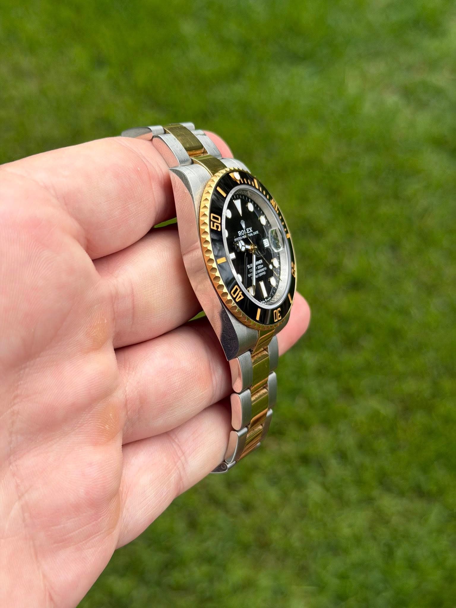 May be an image of wrist watch and text that says '09 ROI ROLEX I POIE 40 An 40'