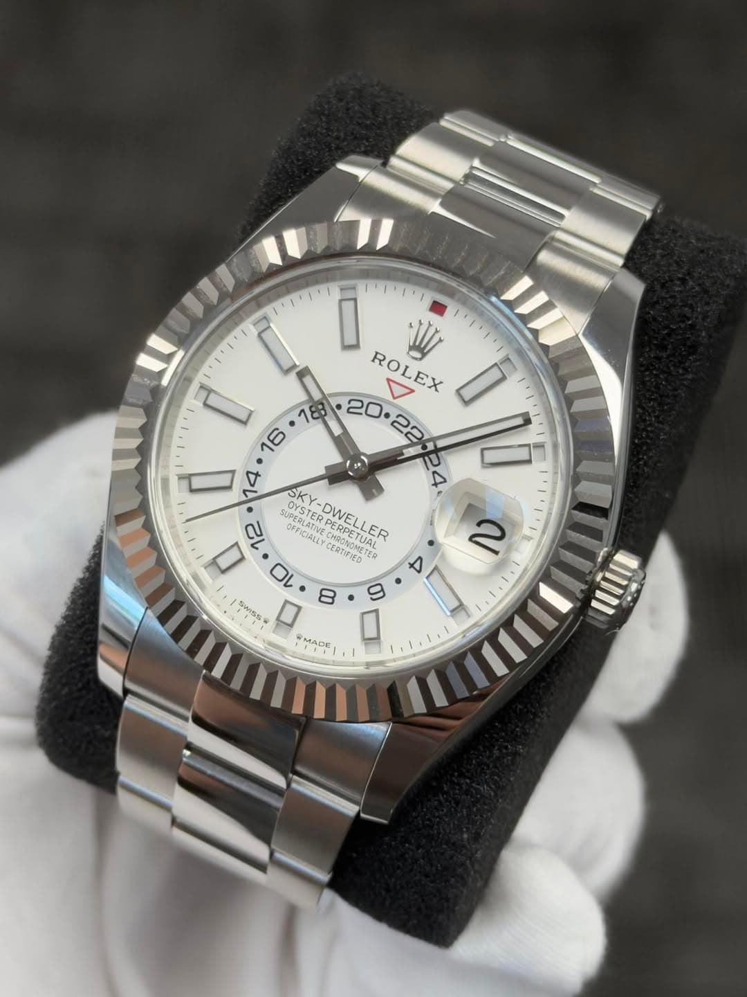 May be an image of wrist watch and text
