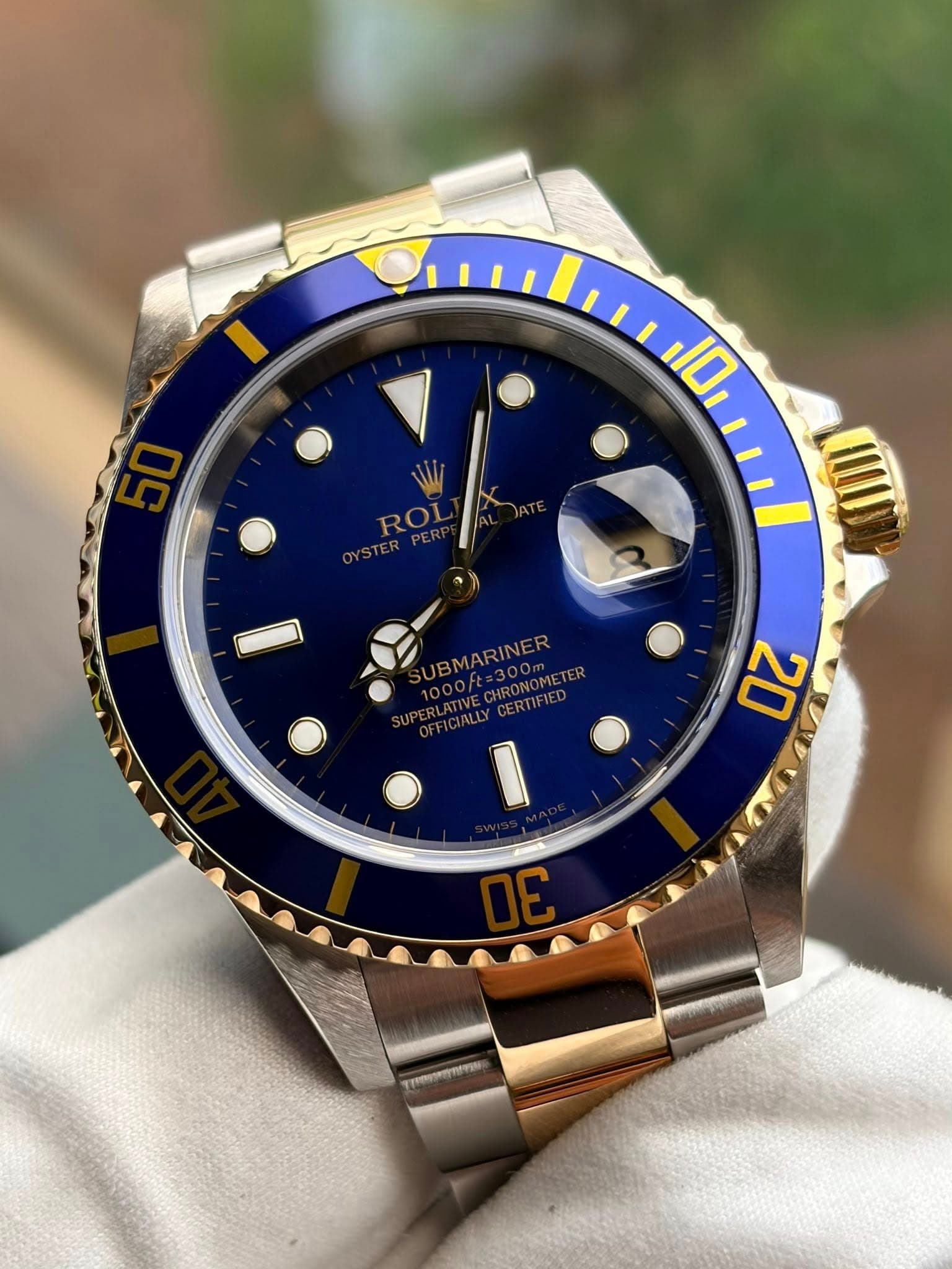 May be an image of wrist watch and text