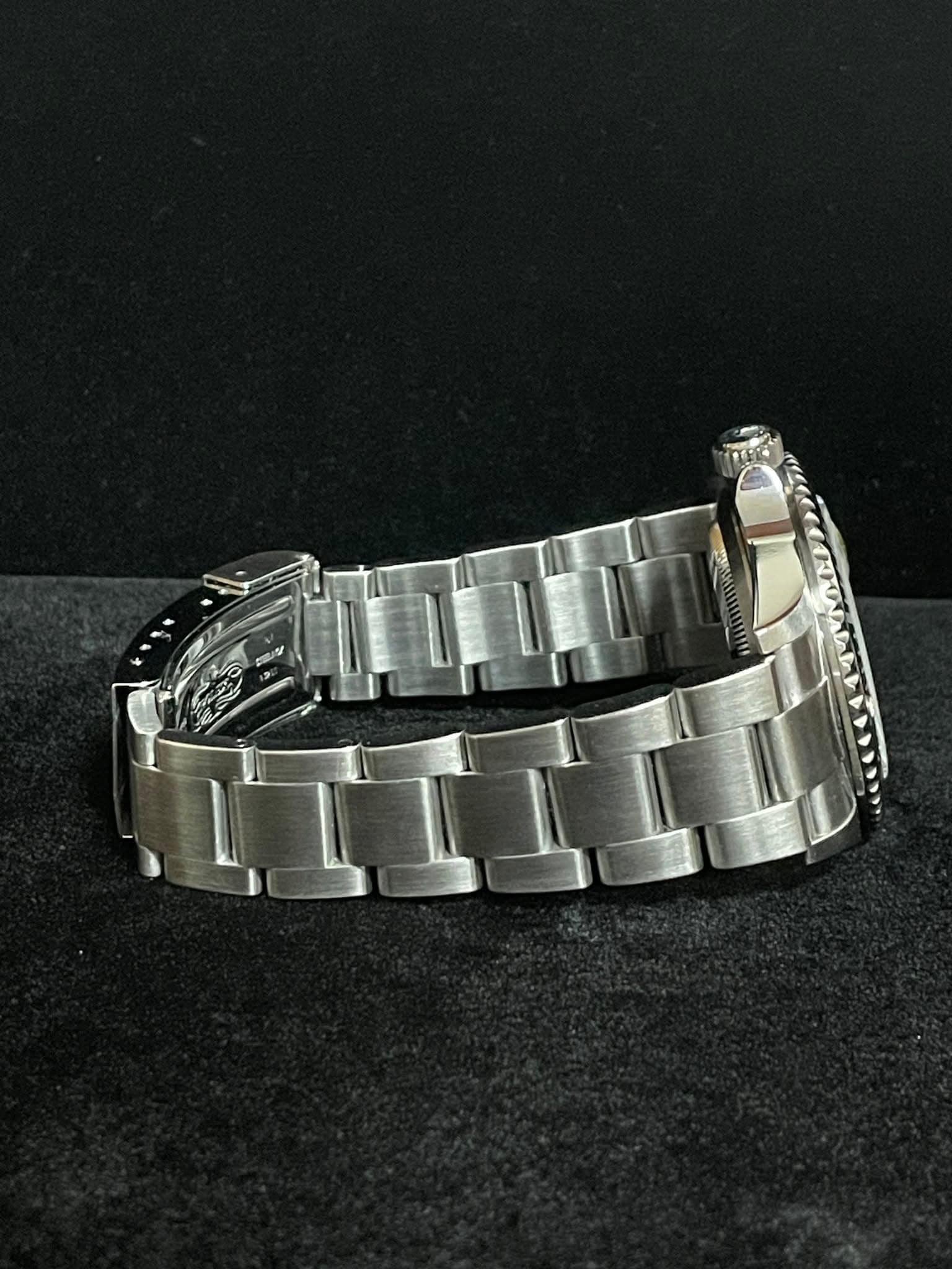 May be an image of wrist watch and jewelry